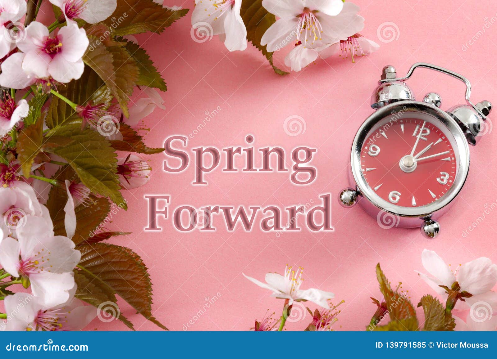 turn clocks on hour ahead, star of daylight savings time change and reminder to spring forward concept with alarm clock on pink