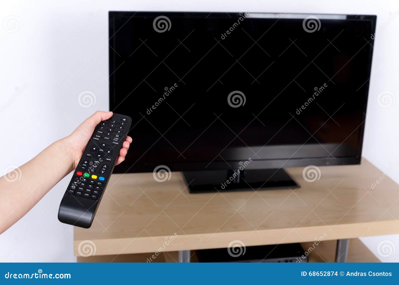 Turning Off The TV Stock Photo - Image: 686528741300 x 946