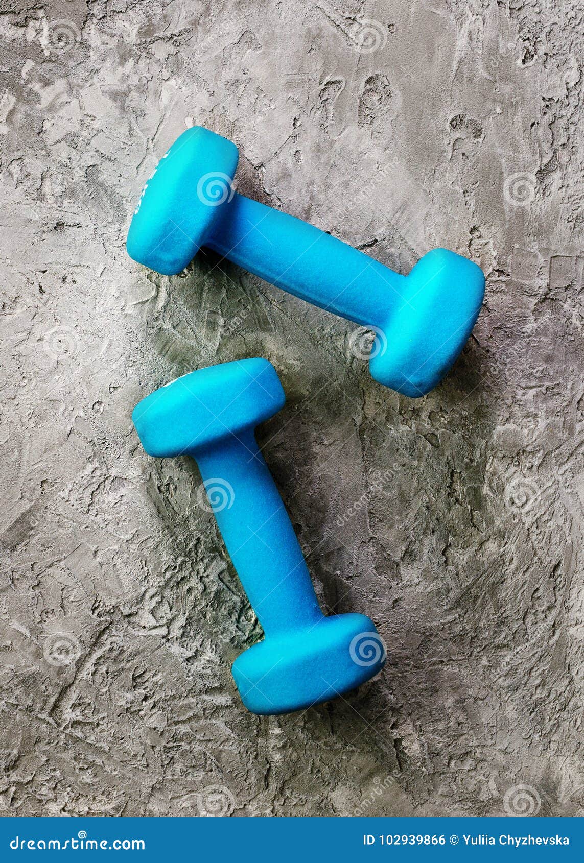 Turquoise Dumbbells with Measuring Tape and Yellow Apple on Concrete ...