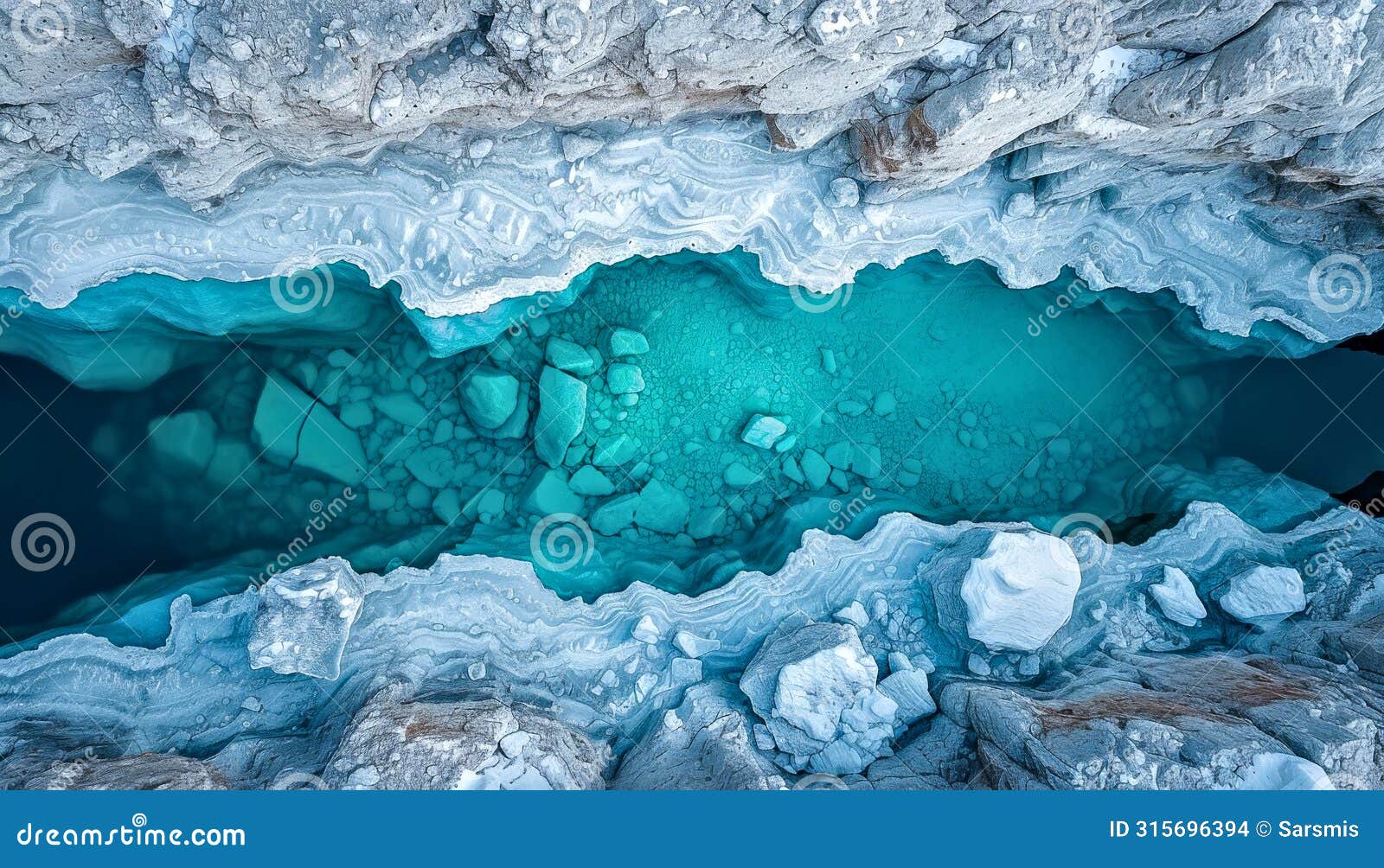 turquoise river flowing through snowy cliffs in a mountainous region.glacial meltwater river