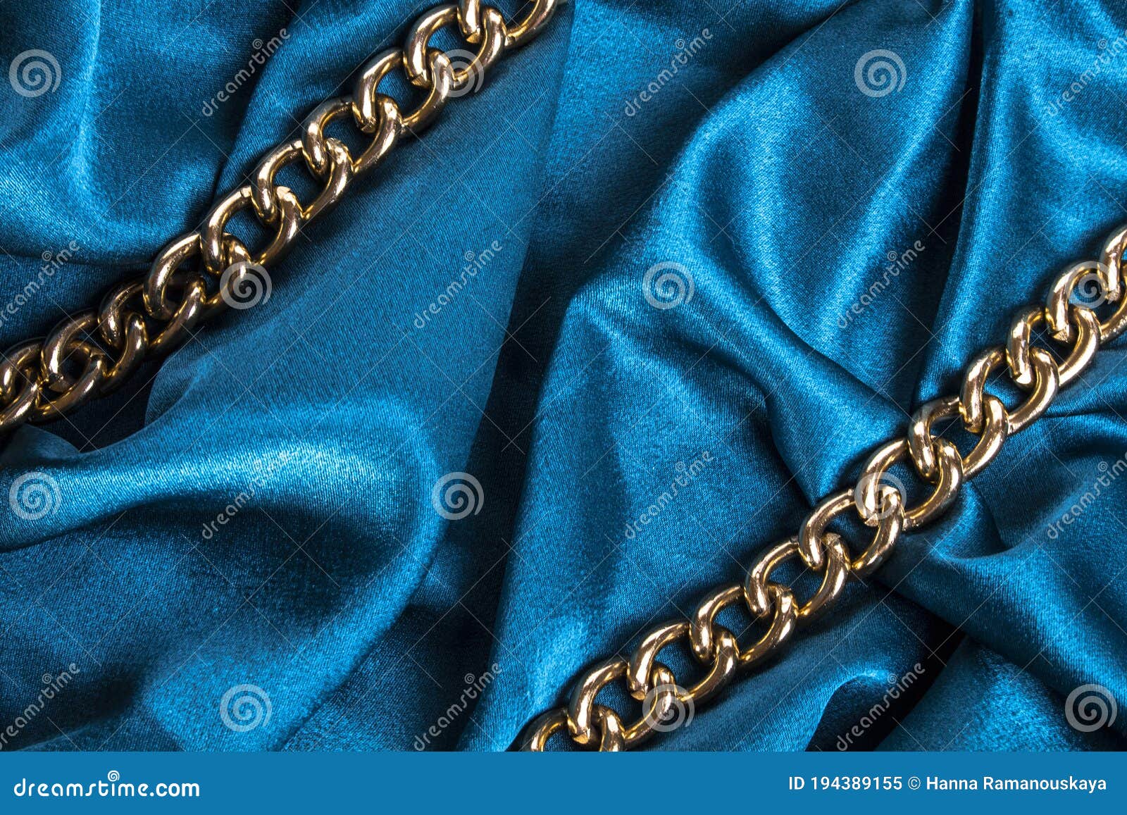 luxury turquoise wavy silk texture with frame of chain background