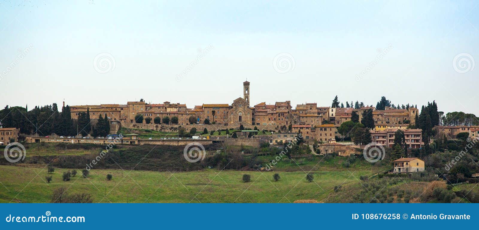 tuscan landscape with ancient buildings of barberino val d`elsa.