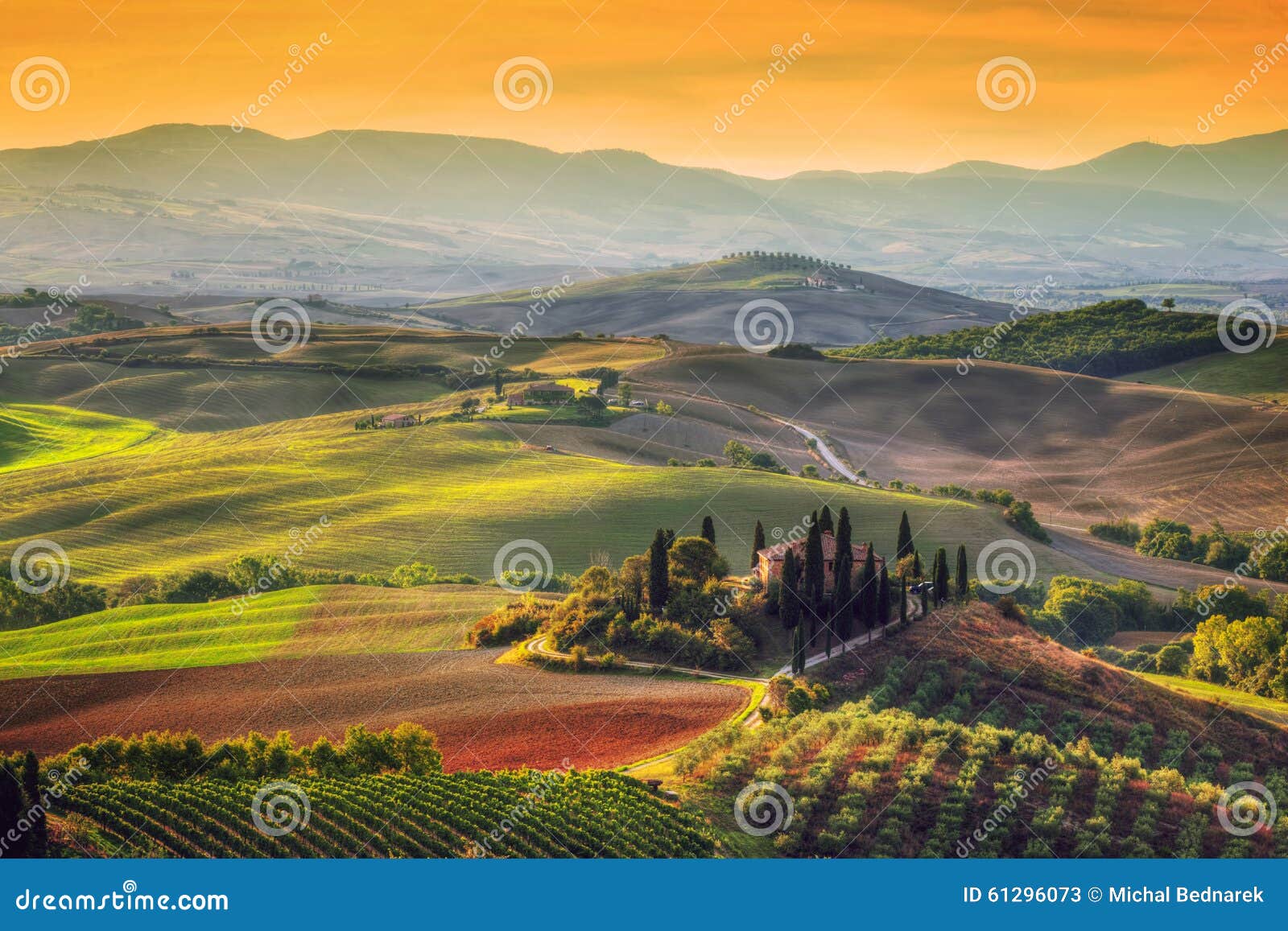 tuscany landscape at sunrise. tuscan farm house, vineyard, hills.