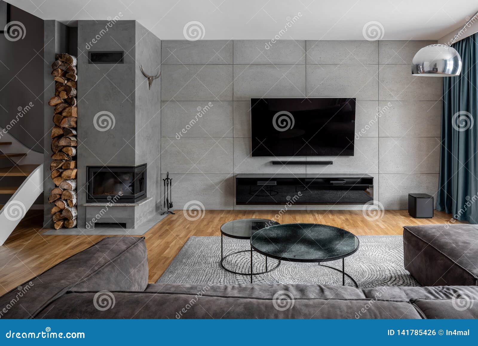 Tv room with cement wall stock photo. Image of lamp 141785426
