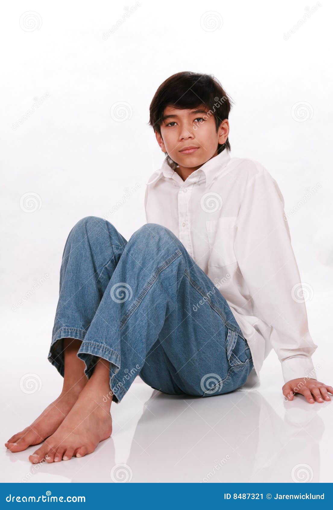 Twelve Year Old Boy Sitting on Floor Stock Image Image of shirt