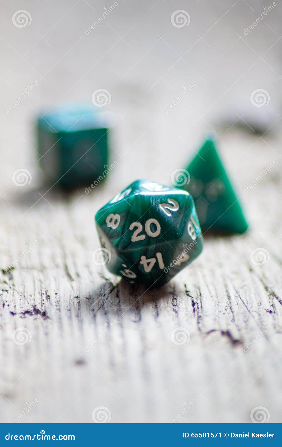 D20 Twentysided Black Metallic Die Dice On Foam Background In Bright
