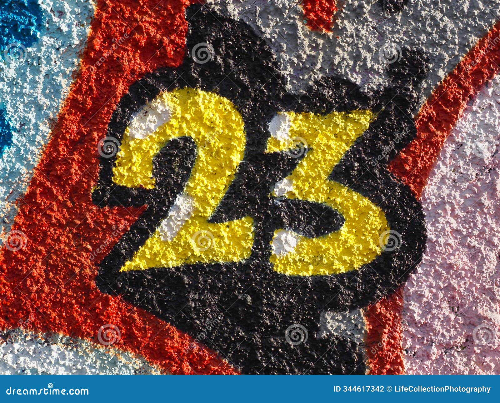 twenty three or 23, colorful painted house number, close up.