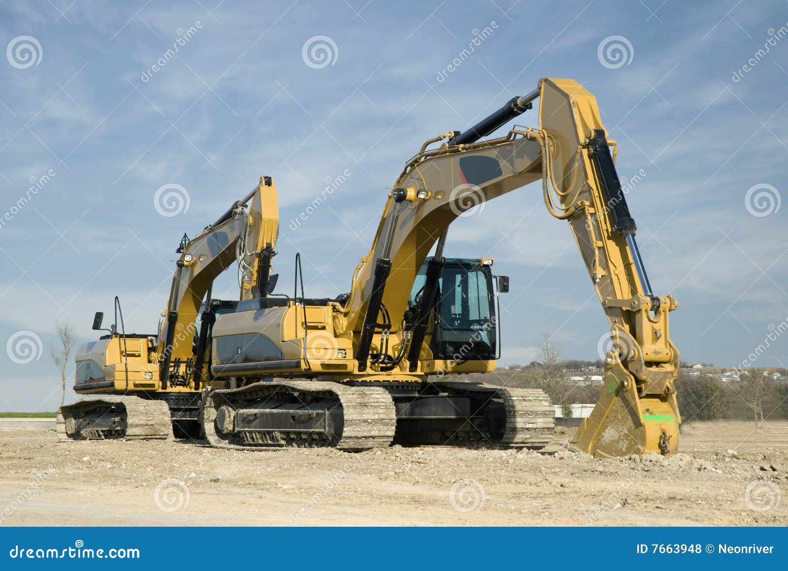 Twin Excavators stock photo. Image of yellow, shovel, black 7663948