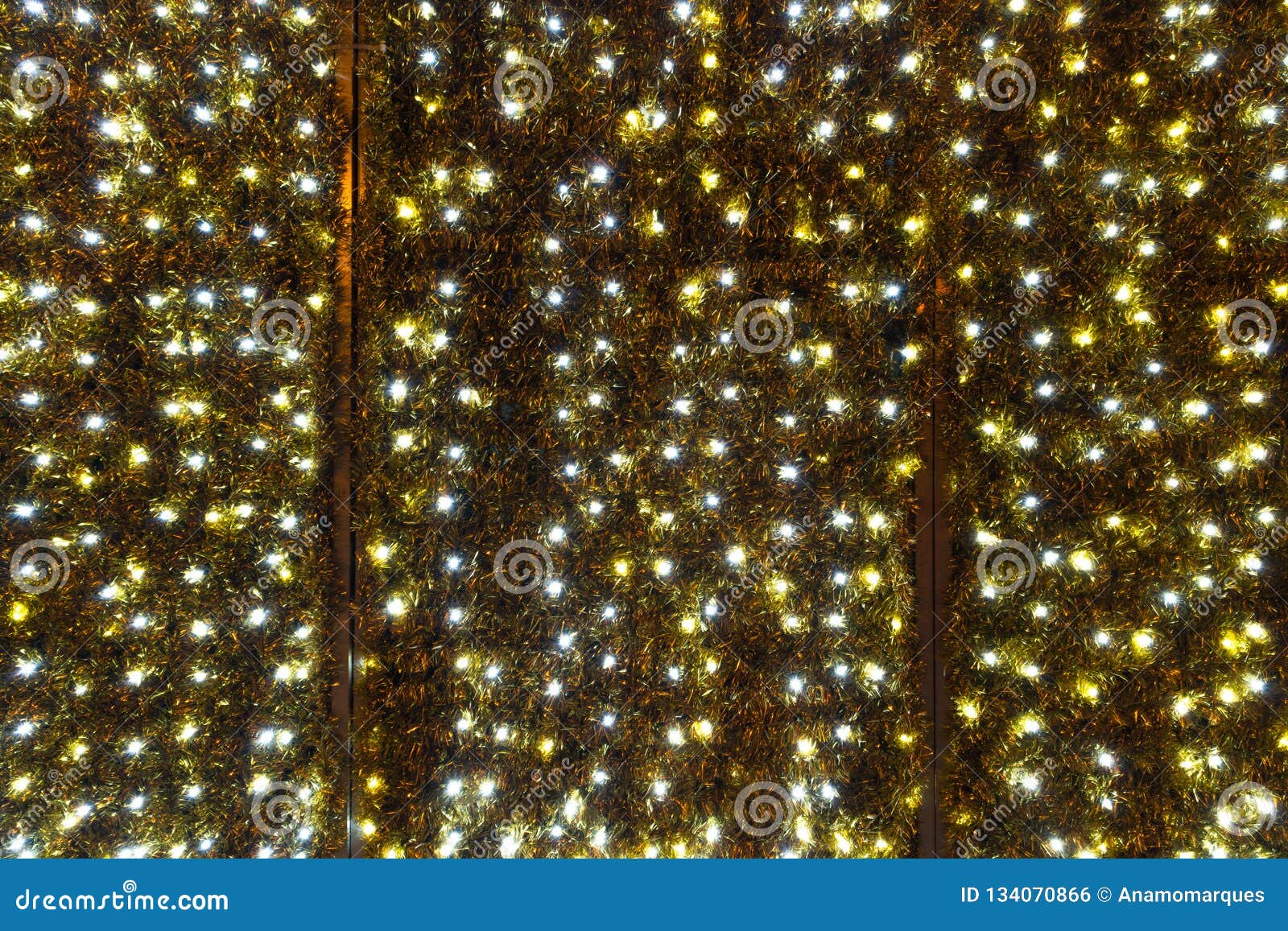 Twinkling Christmas Lights Background. Wall with Christmas Lights Stock