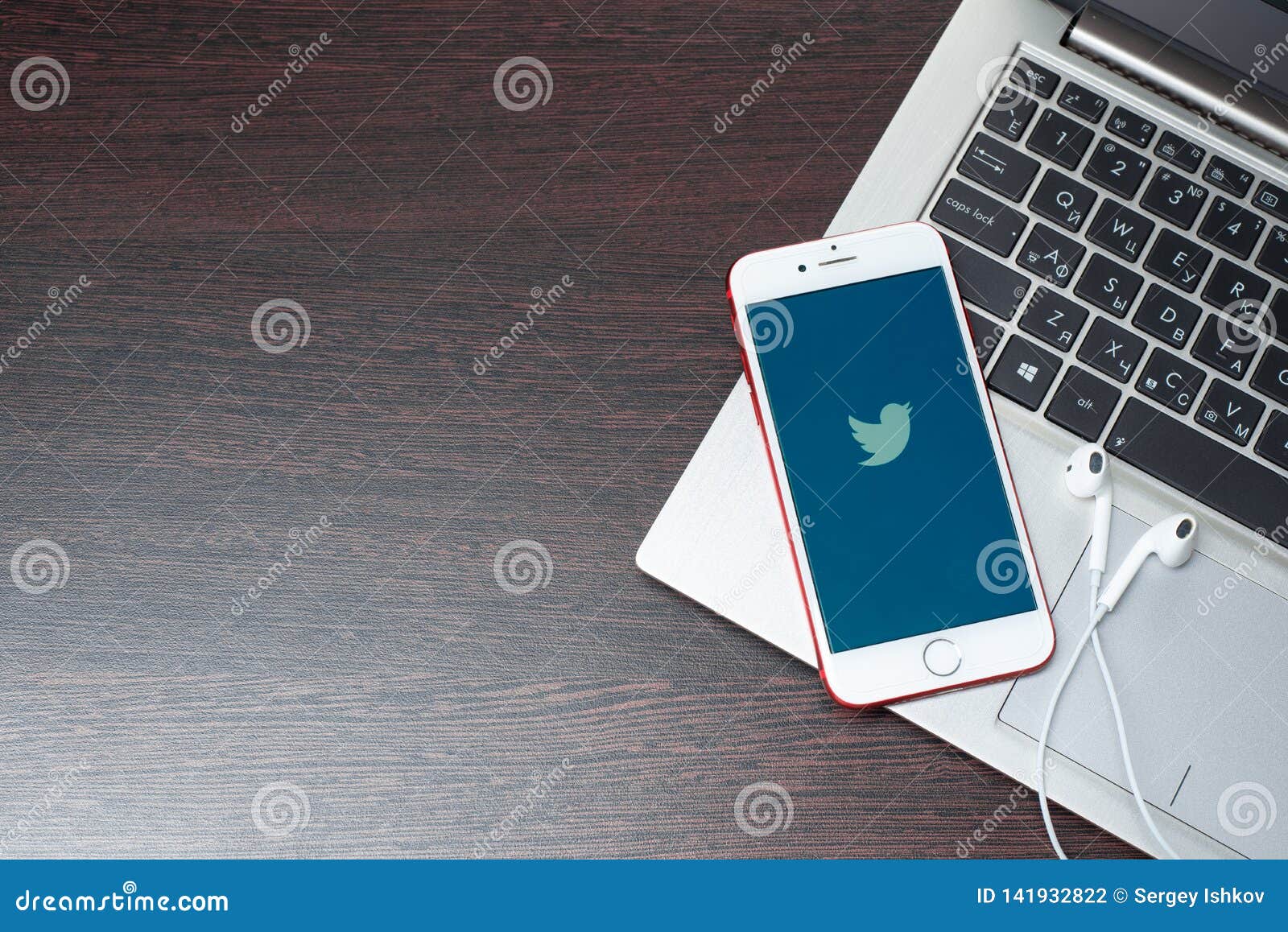 Twitter Logo on Iphone Screen Placed on Laptop Keyboard Editorial