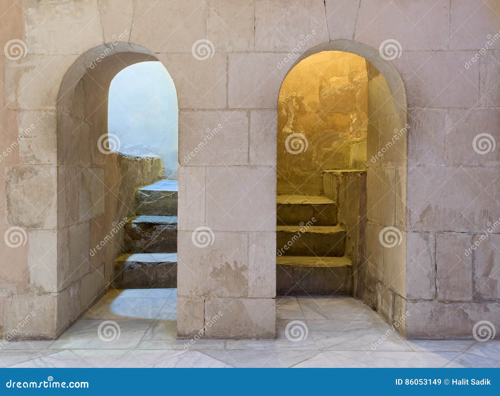Two Adjacent Aged Narrow Dark Vaulted Passages and Stone Bricks Wall