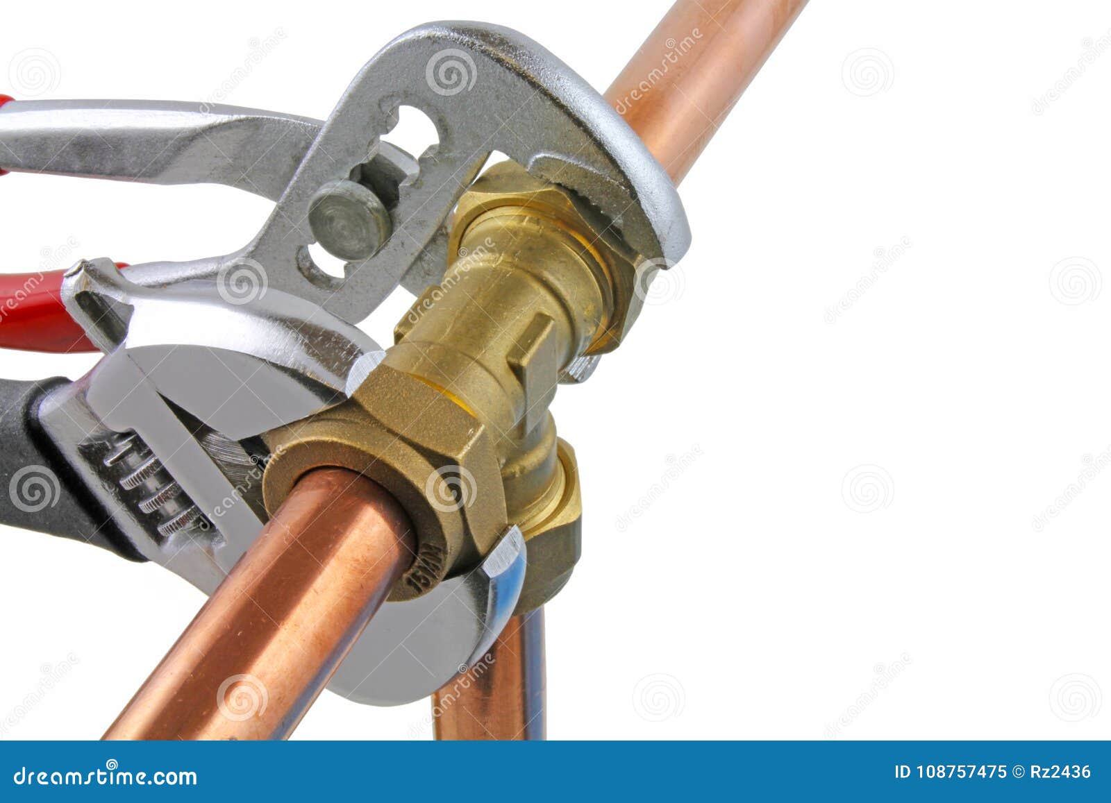 plumber tightening up pipework