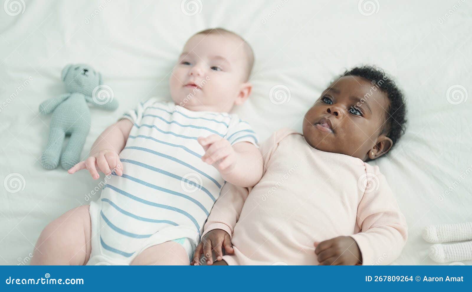Two Adorable Babies Lying on Bed at Bedroom Stock Photo Image of
