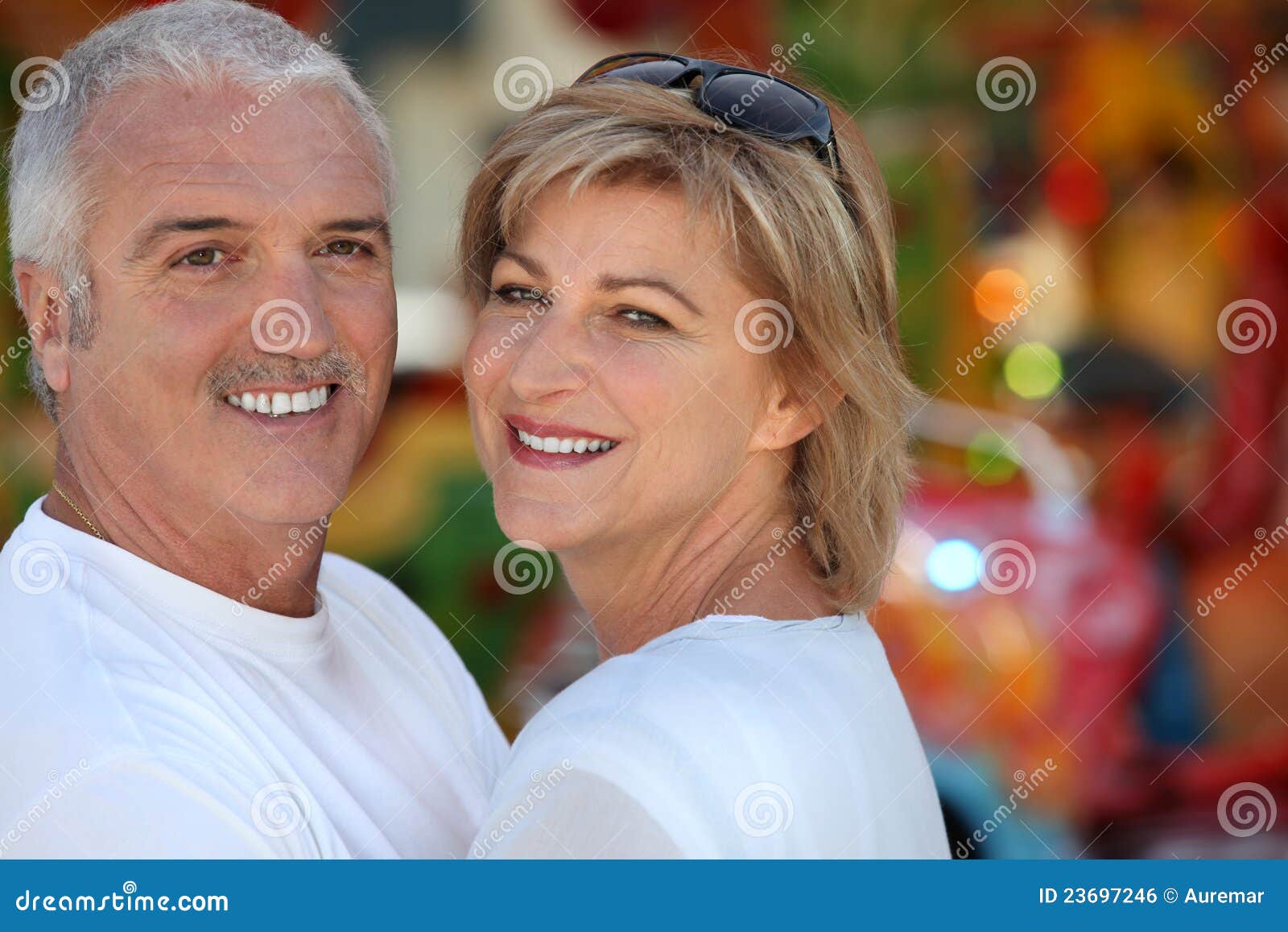 Two adults at funfair stock photo. Image of exciting - 23697246