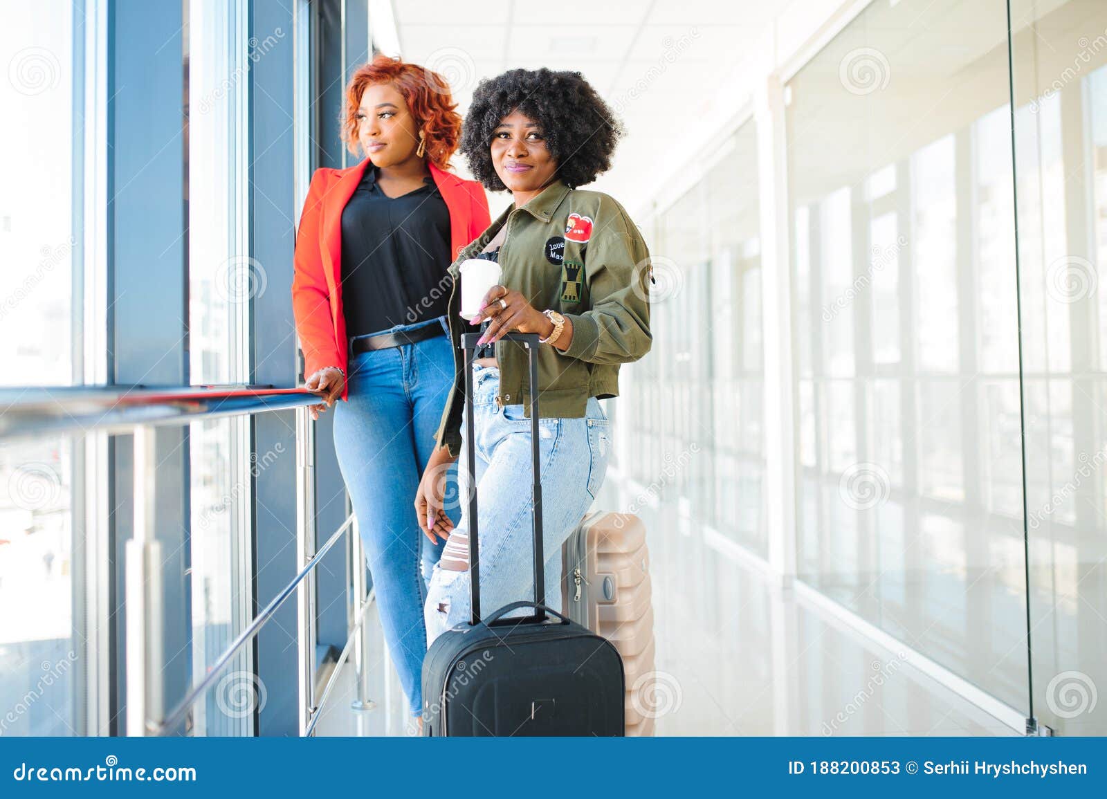 Two African Girls with Suitcases at the Airport. the Concept of Travel ...