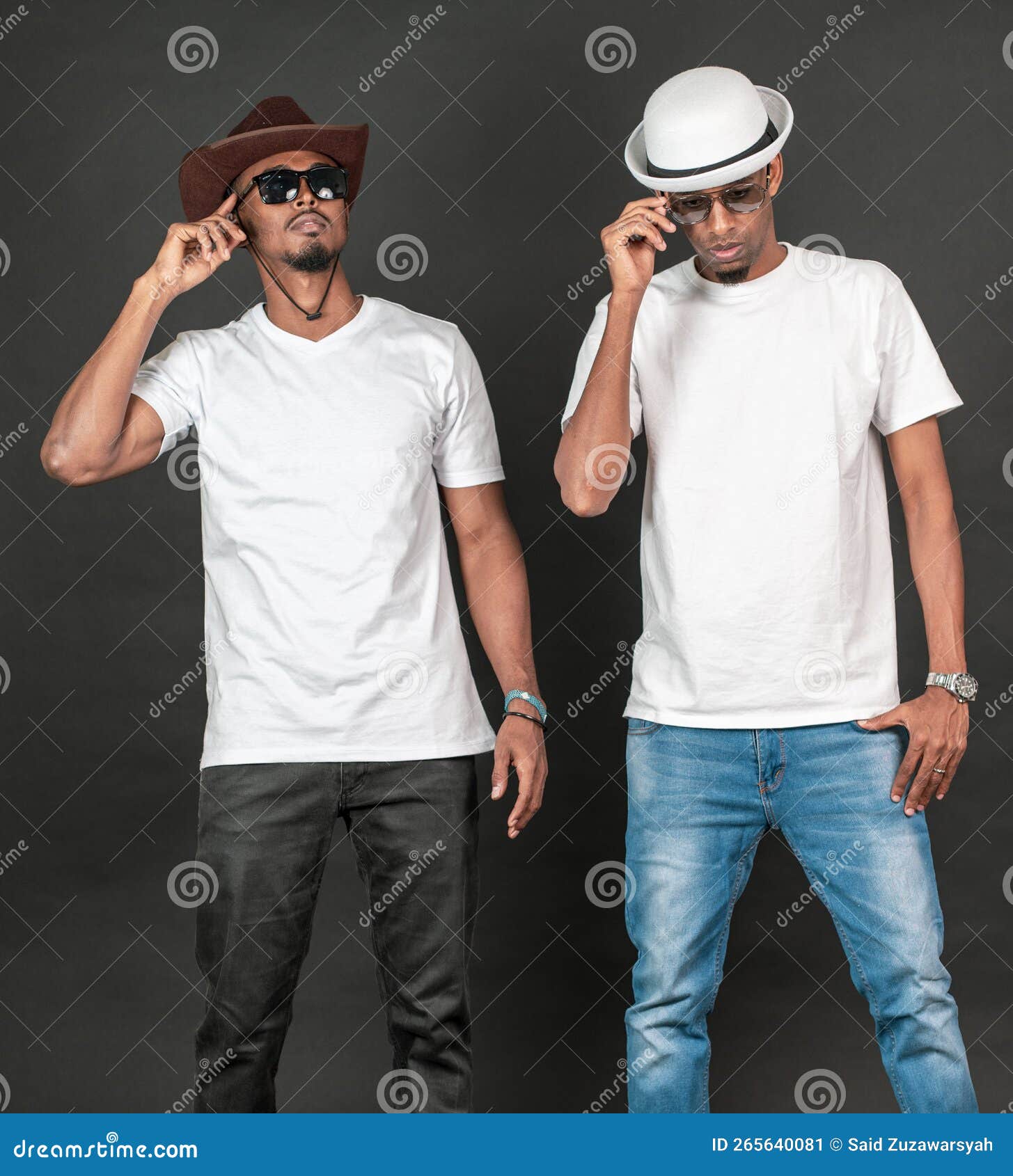 Handsome Young Man in Casual Clothes Holding His Cap and Posing To the  Camera Stock Image - Image of black, afro: 153799223