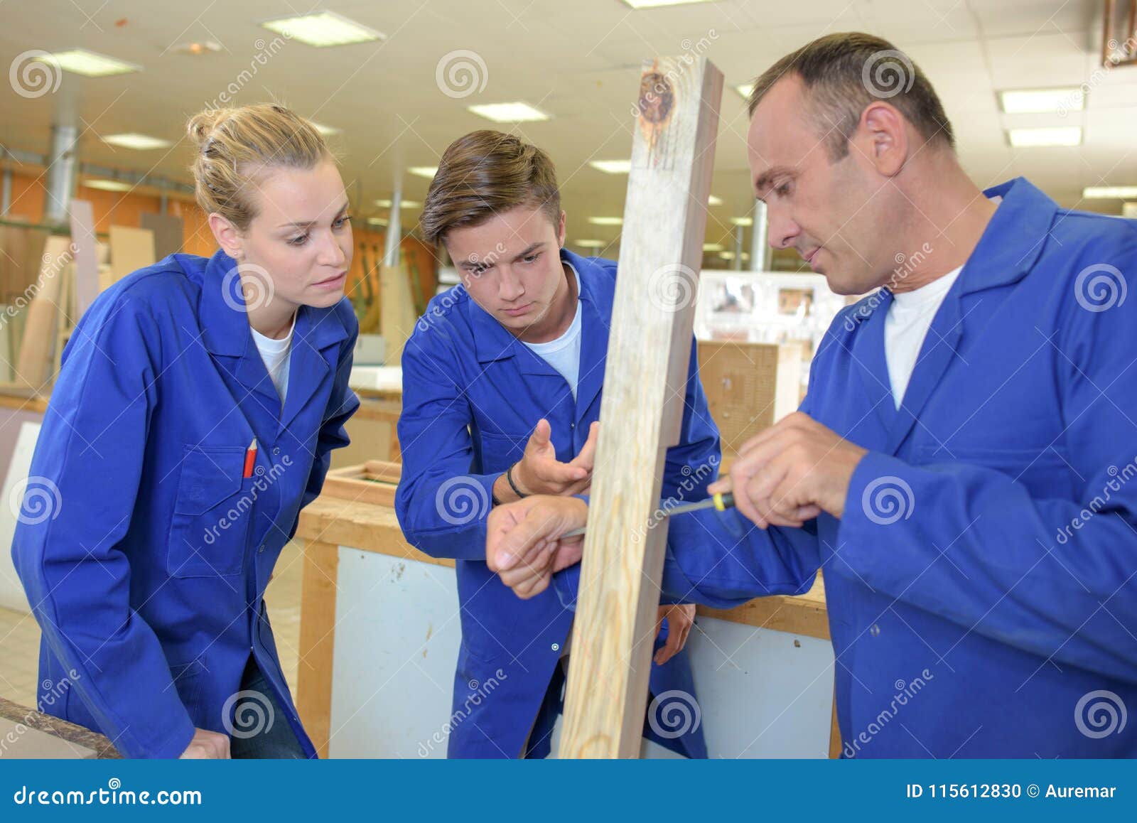 Two Apprentices Watching Joiner at Work Stock Photo Image of handwork