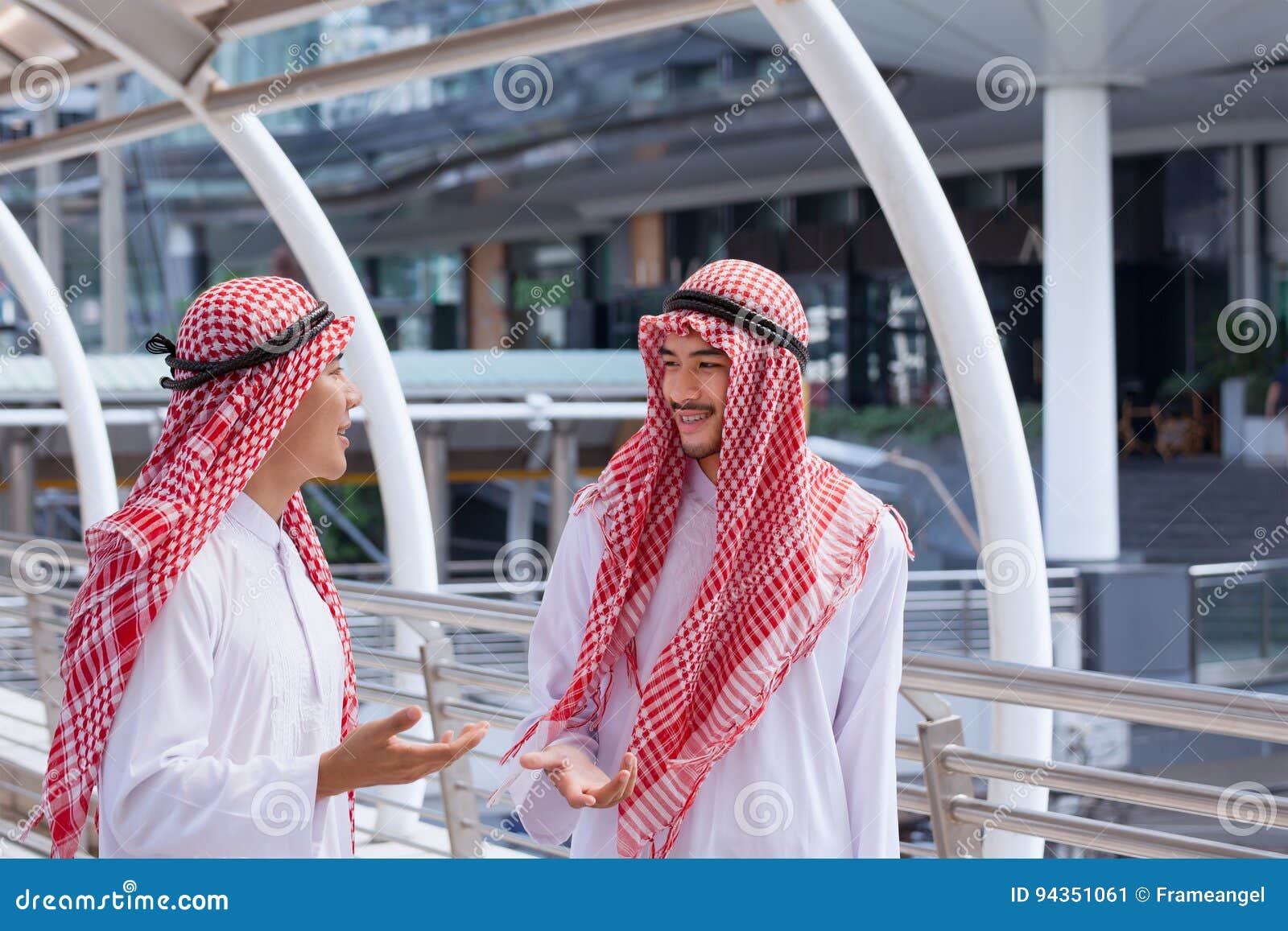 Two Arabian Business Men Discuss and Walk Together Around Modern Stock ...