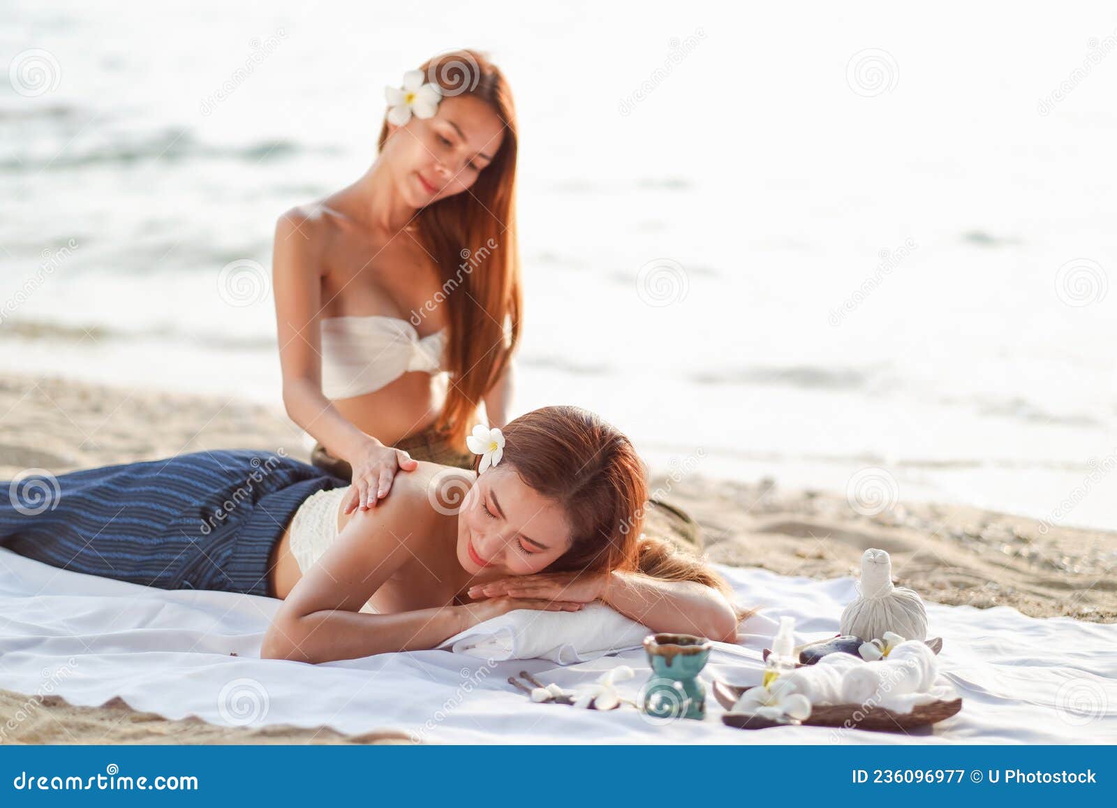 Two Asia Women Doing Spa Massage Together On The Beach Stock Image Image Of Beautiful Calm