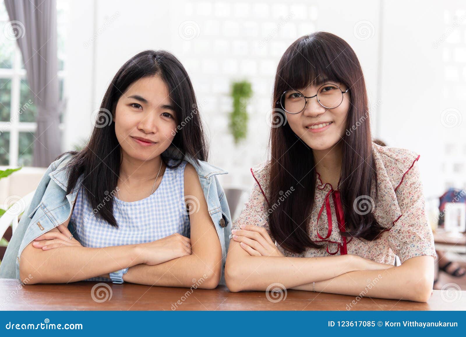 1300px x 957px - Two Asian Girl Teen Sitting Together Look and Smile Stock Image - Image of  friendship, female: 123617085