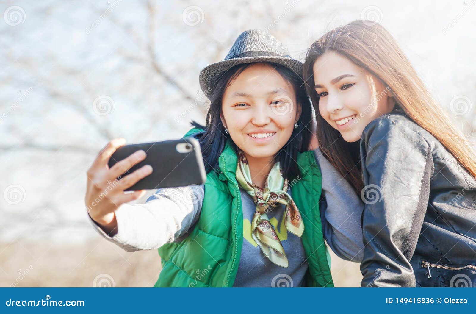 https://thumbs.dreamstime.com/z/two-asian-girlfriends-teen-girls-new-technology-trends-friendship-concept-trendy-making-video-story-social-network-app-149415836.jpg