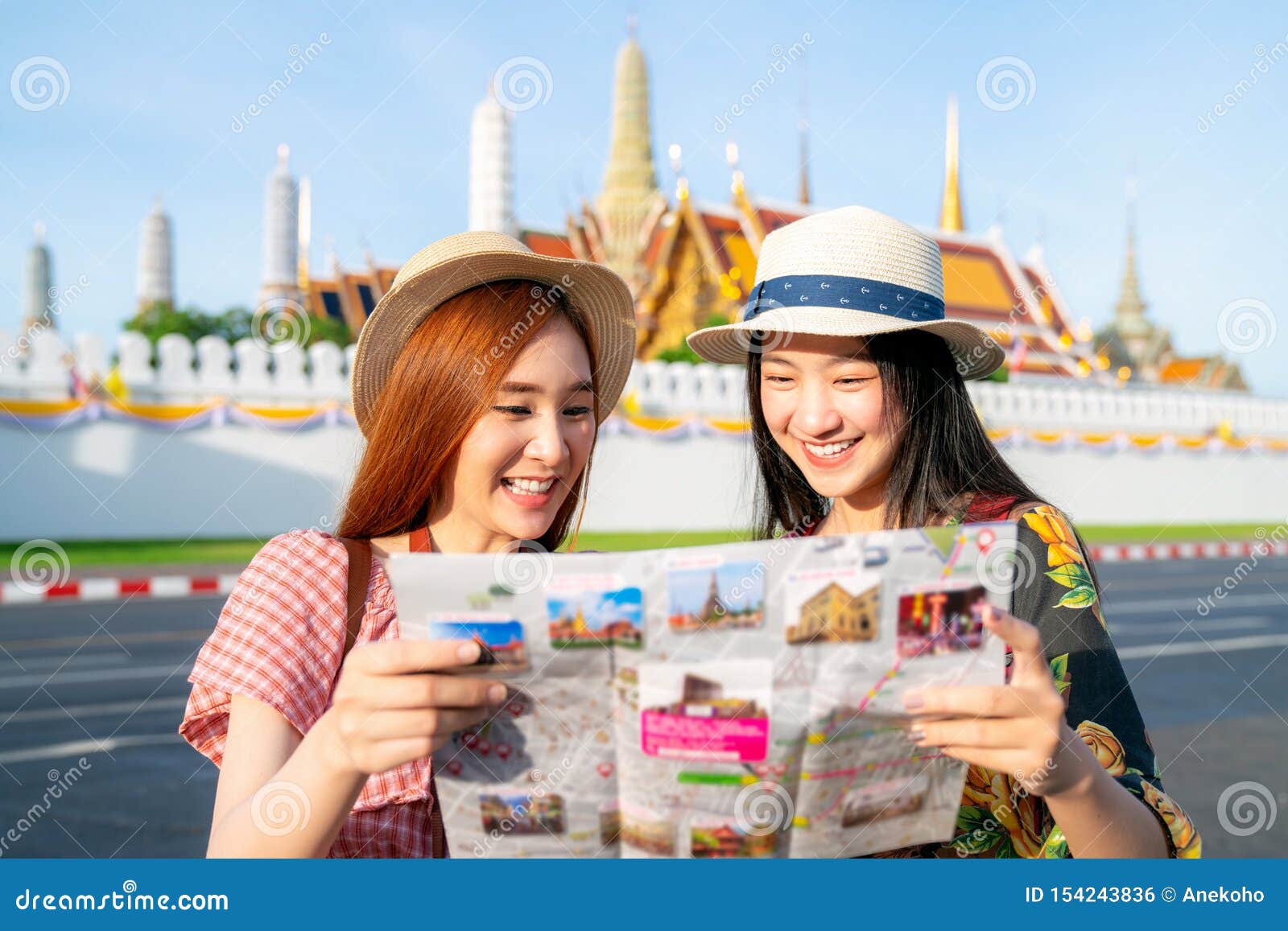 https://thumbs.dreamstime.com/z/two-asian-girlfriends-traveling-check-location-map-grand-palace-wat-phra-kaew-bangkok-thailand-two-asian-154243836.jpg