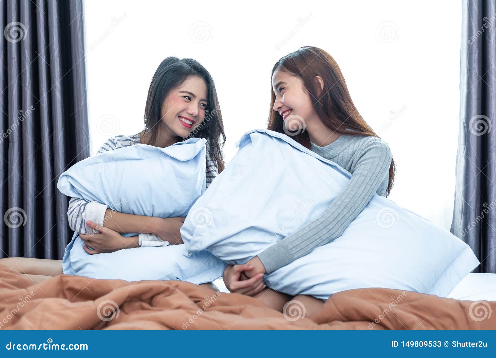 Two Asian Lesbian Looking Together In Bedroombeauty Concept Happy