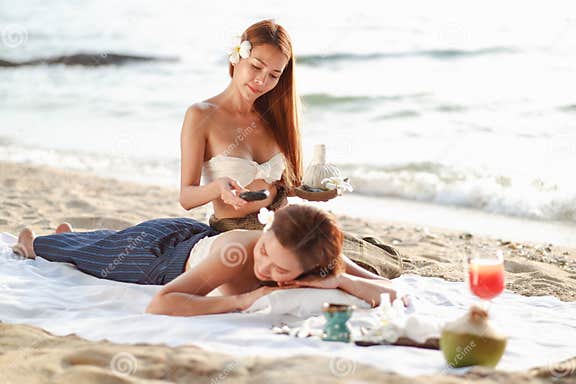 Two Asia Women Doing Spa Massage Together On The Beach Stock Image Image Of Aroma Asian