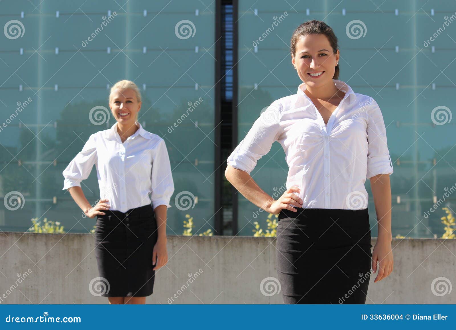 Two Attractive Business Women Posing on the Street Stock Photo - Image ...