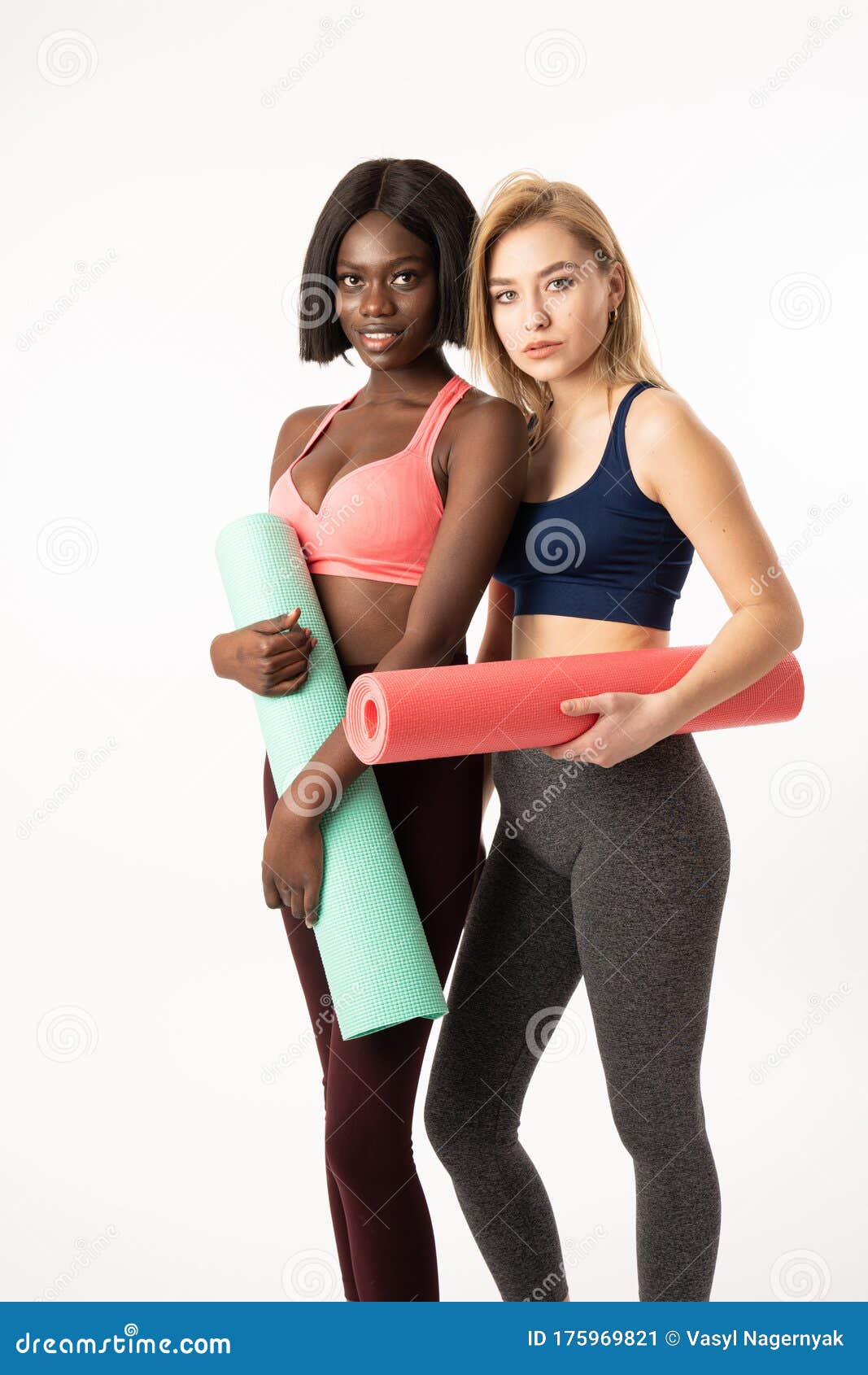 Two Attractive International Girls. Practicing Yoga Every Day. Girls Slim  Fit Athlete Holding Fitness Mat Stock Image - Image of girl, athlete:  175969821