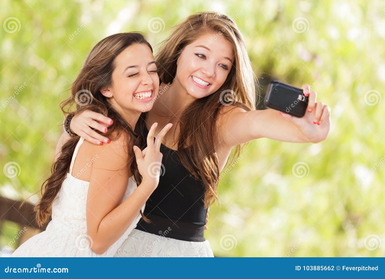 Teenagers with Computer. Two young and attractive 