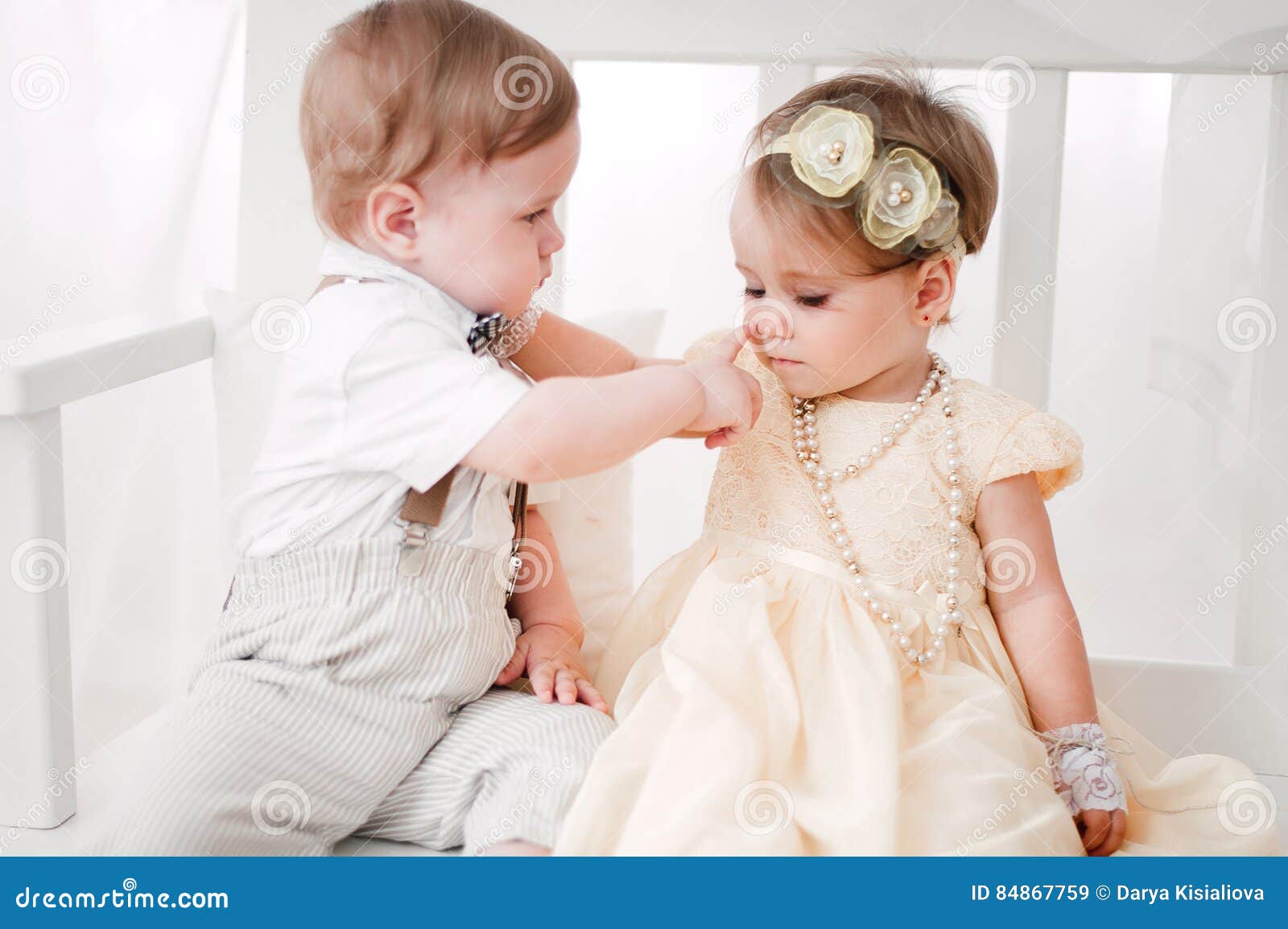 Two Babies Wedding Boy And Girl Dressed As Bride And Groom Stock
