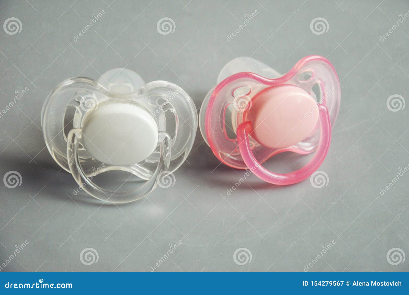 Two Baby Nipples. Pacifiers Pink and White. Stock Image - Image of ...