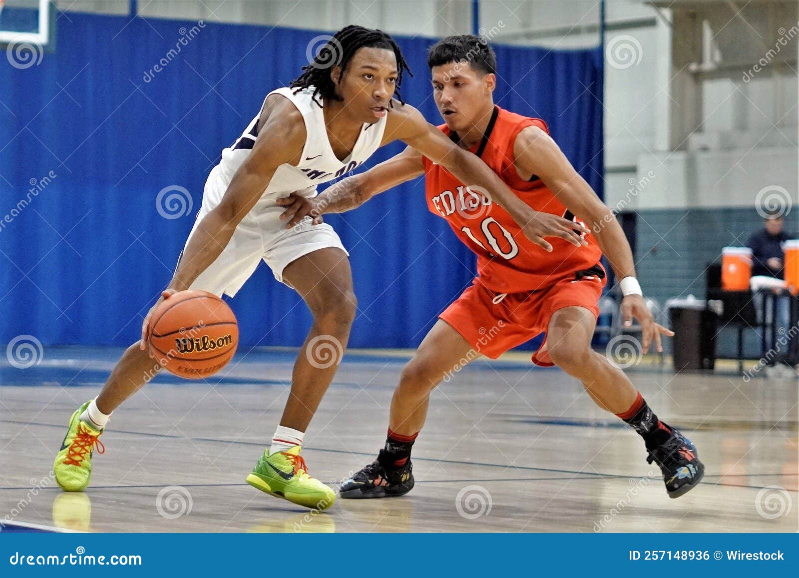 Basketball Players in a High School Basketball Match Editorial Photo