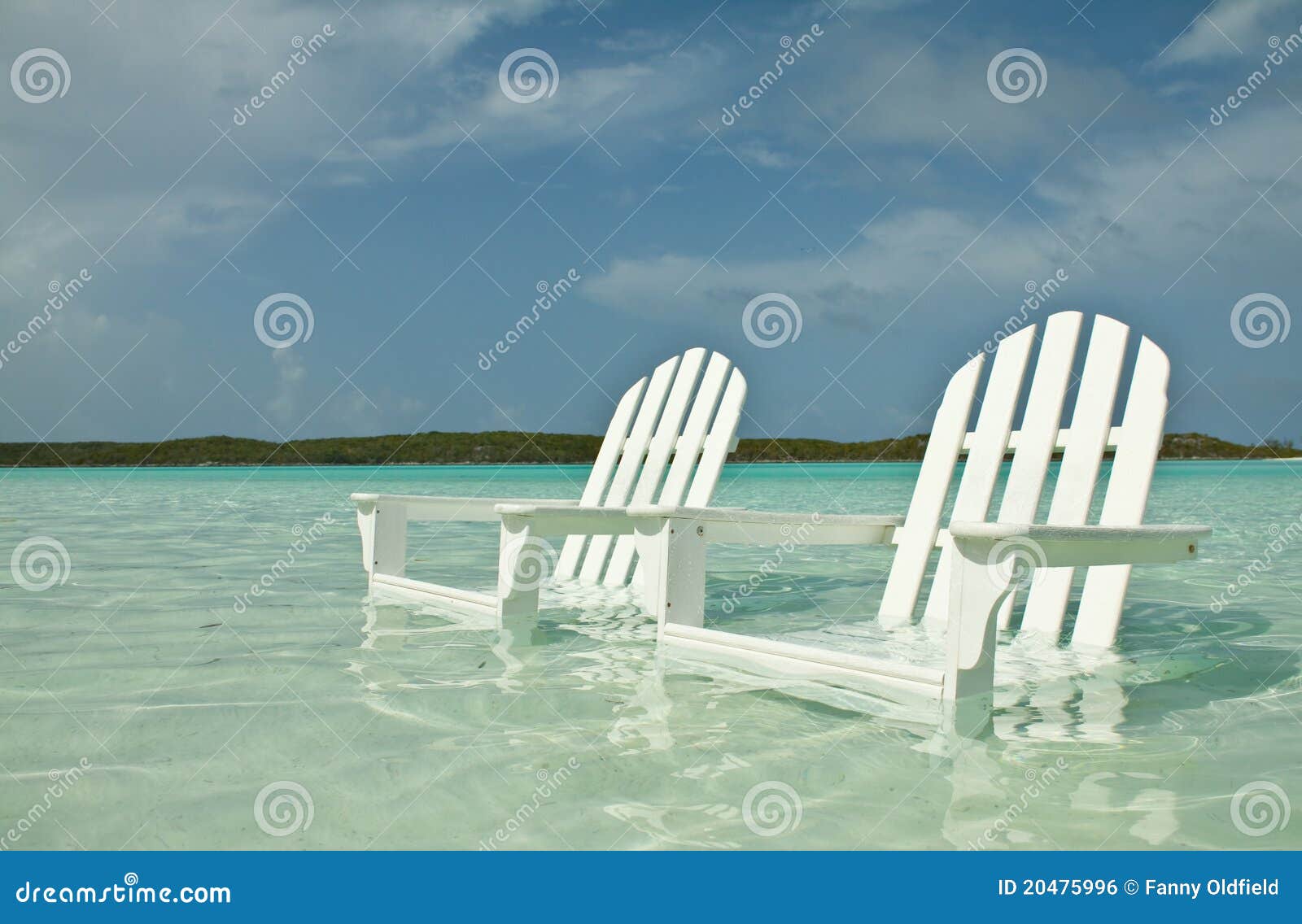 Two beach chairs stock photo. Image of water, chairs 20475996