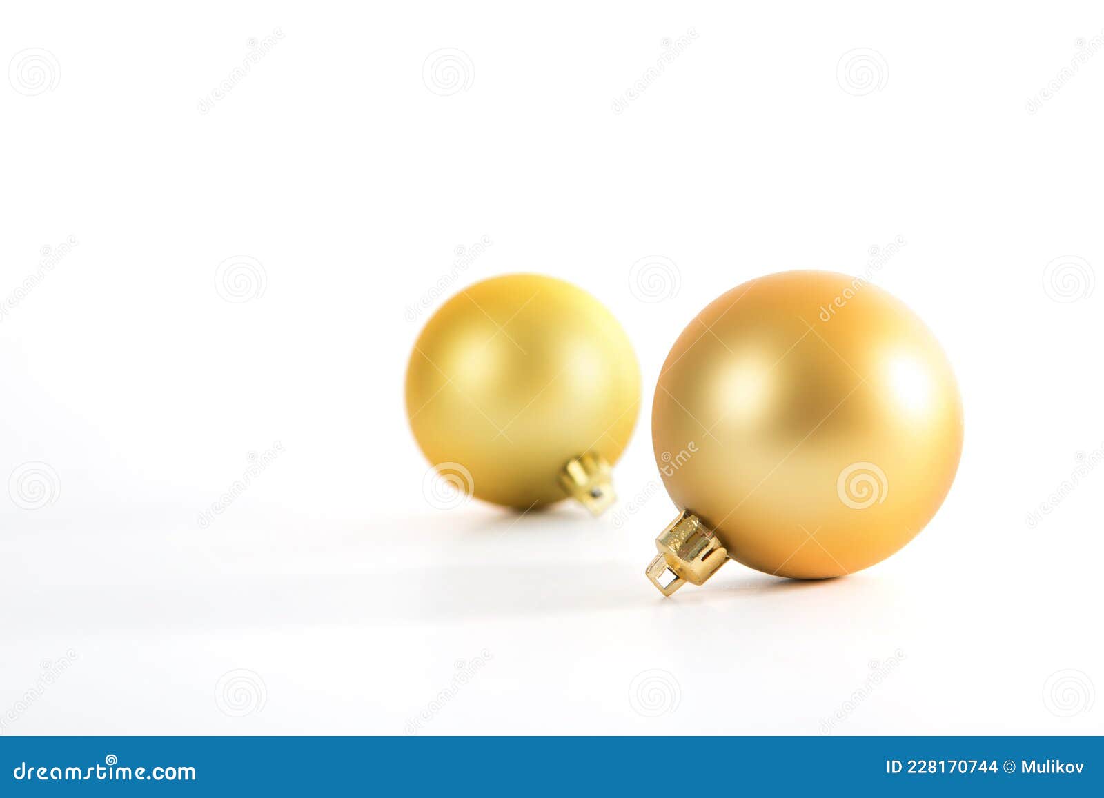 Two Beautiful Christmas Gold Balls Isolated on White Stock Photo