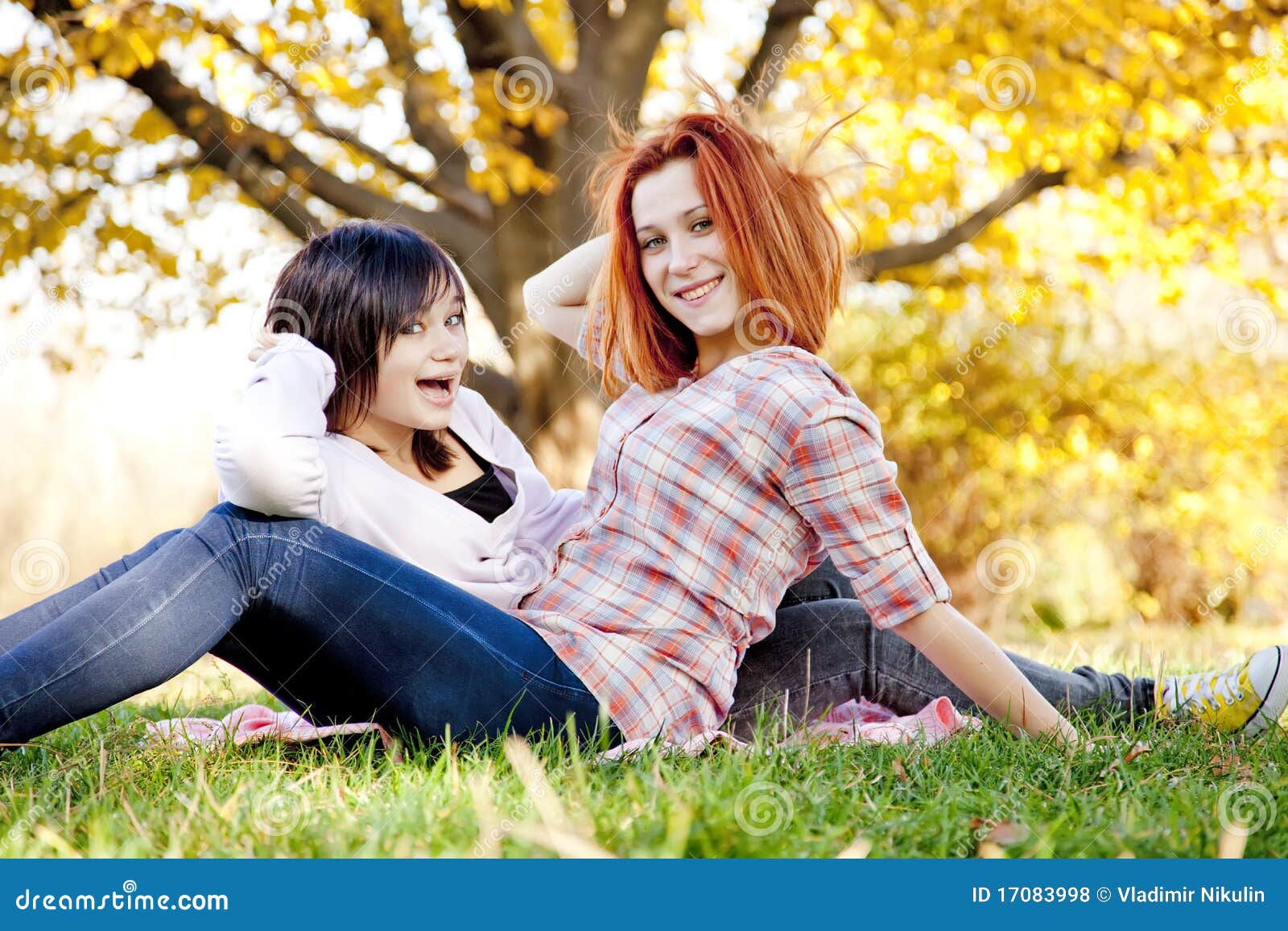 Two Beautiful Girlfriends at the Autumn Park Stock Photo - Image of ...