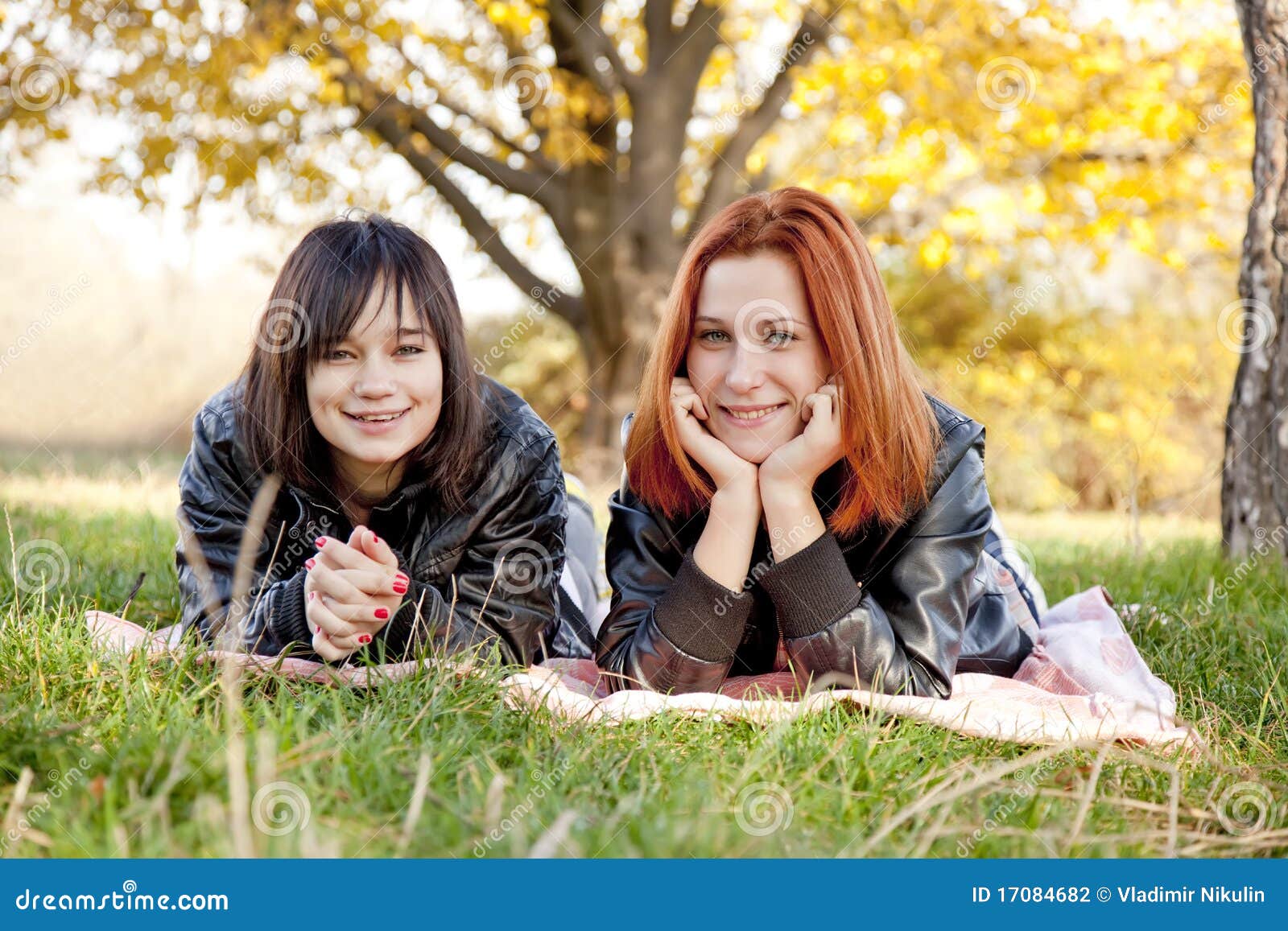 Two Beautiful Girlfriends At The Autumn Park Stock