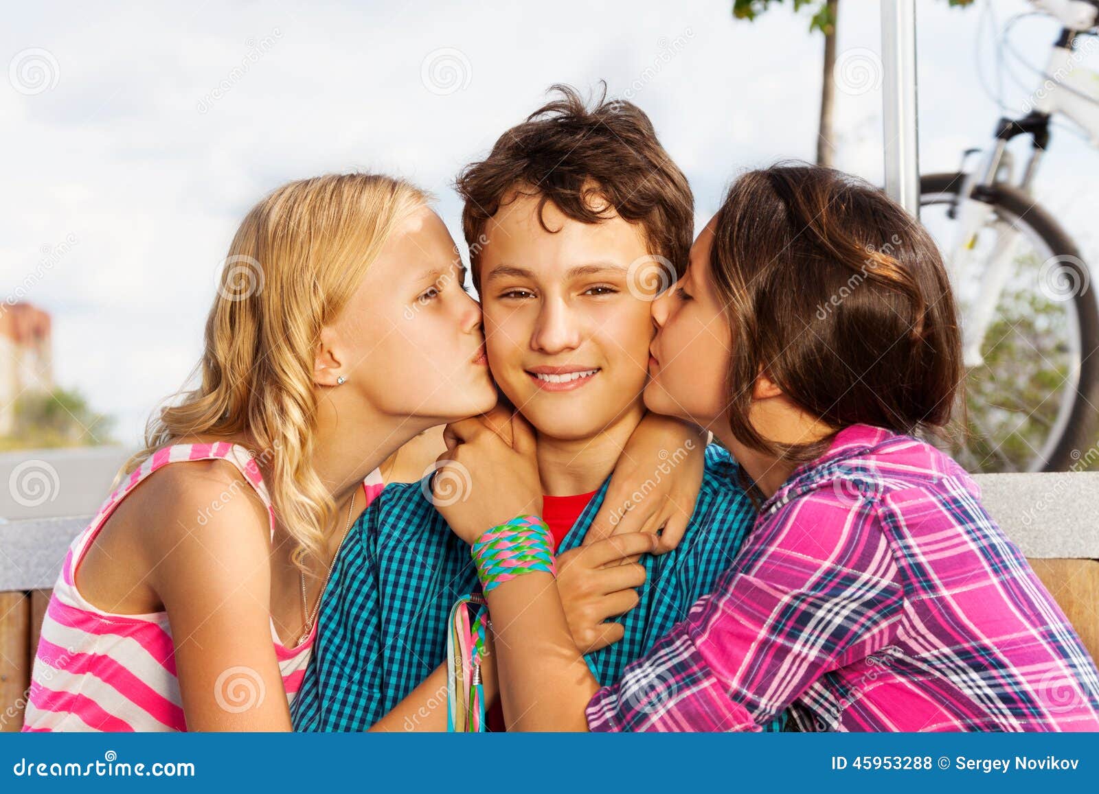 Two Beautiful Girls Kissing Smiling One Cute Boy Stock Photo ...