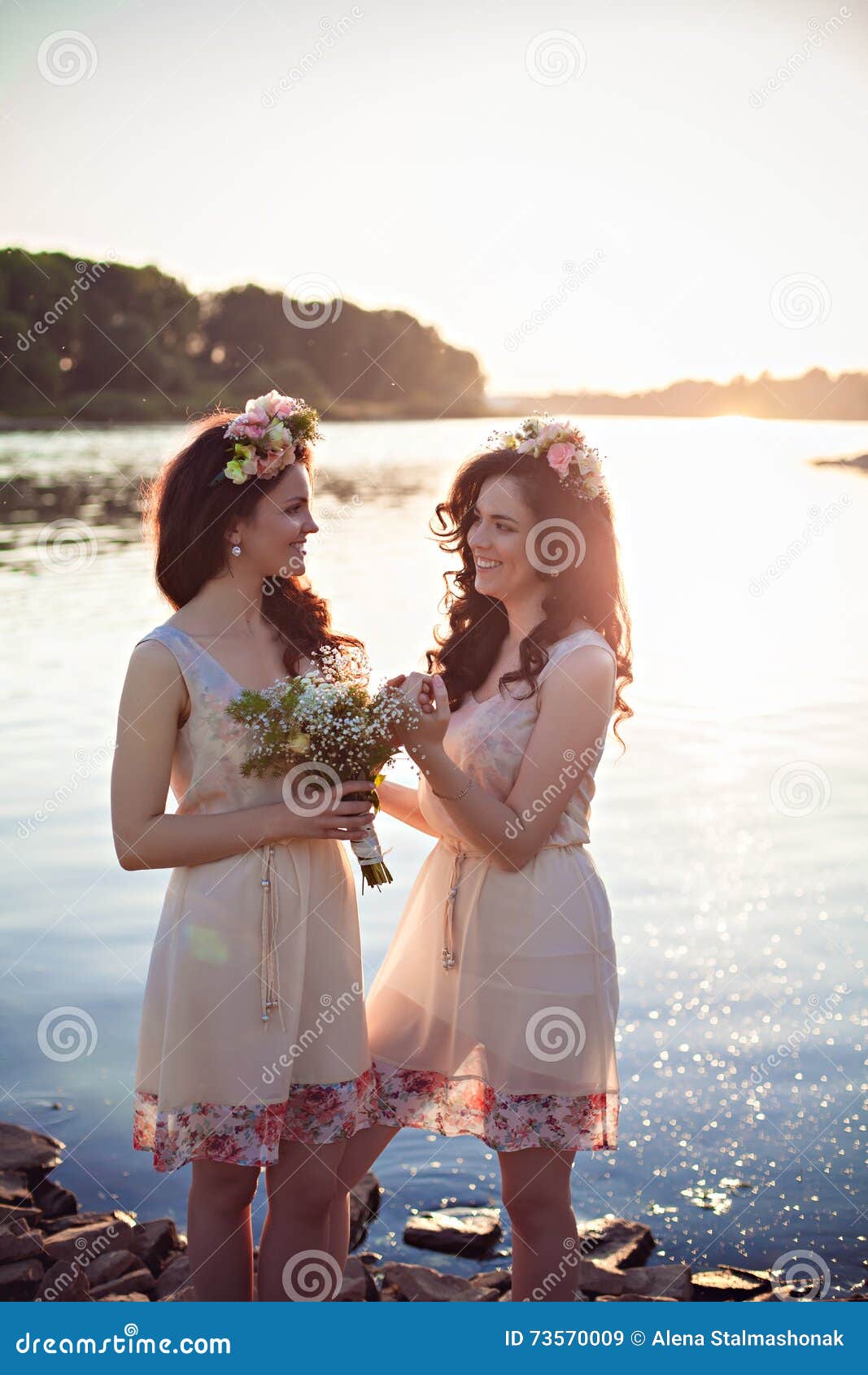 Two Beautiful Sisters in the Rays of Sunset Stock Image - Image of
