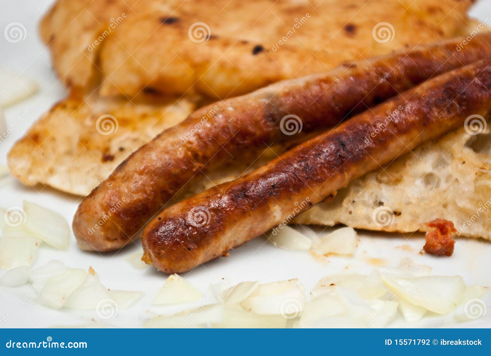 Two Beed Sausages on Flatbread with Onion Stock Photo Image of dinner