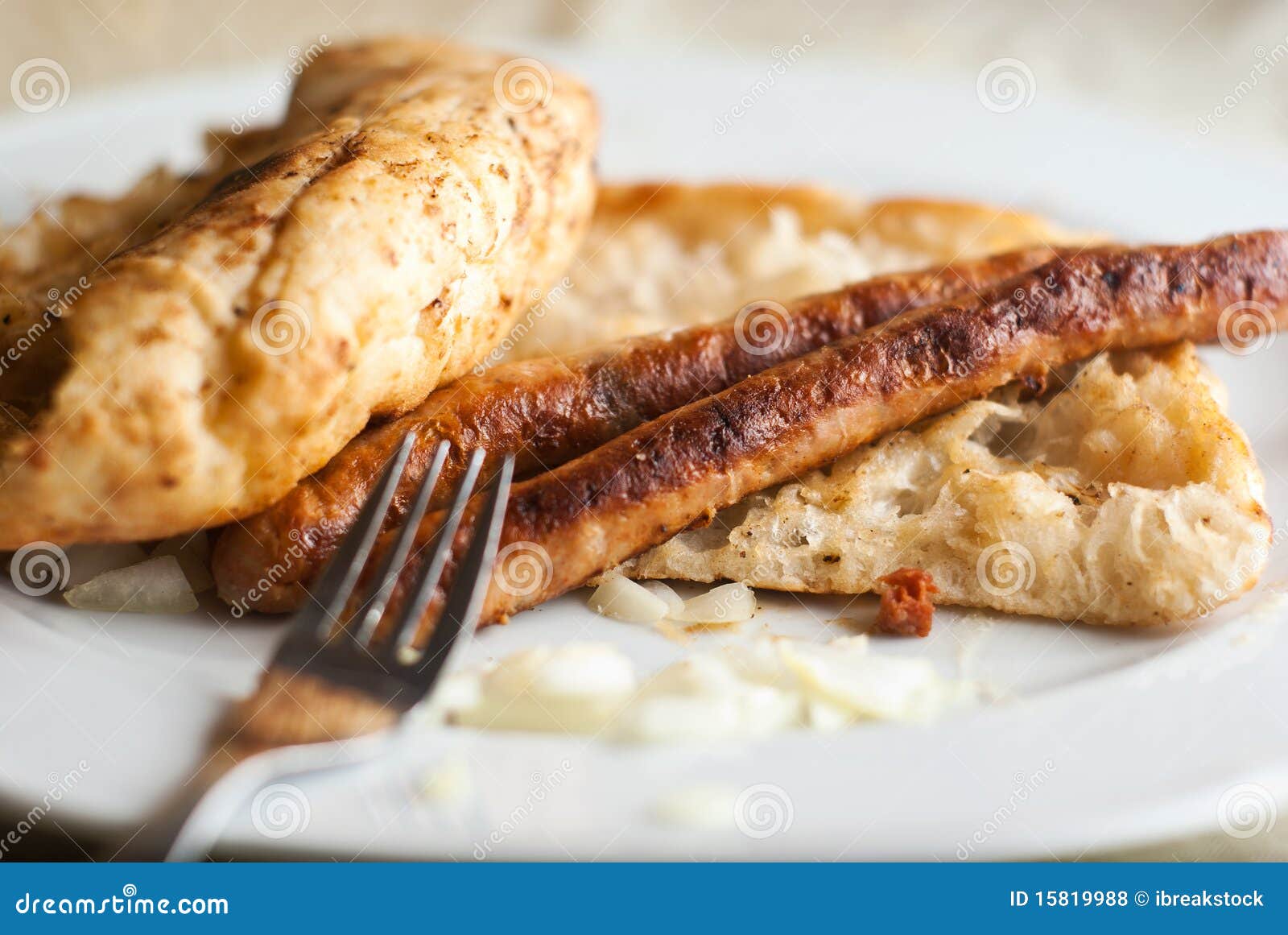 Two Beed Sausages on Flatbread with Onion Stock Photo Image of onion