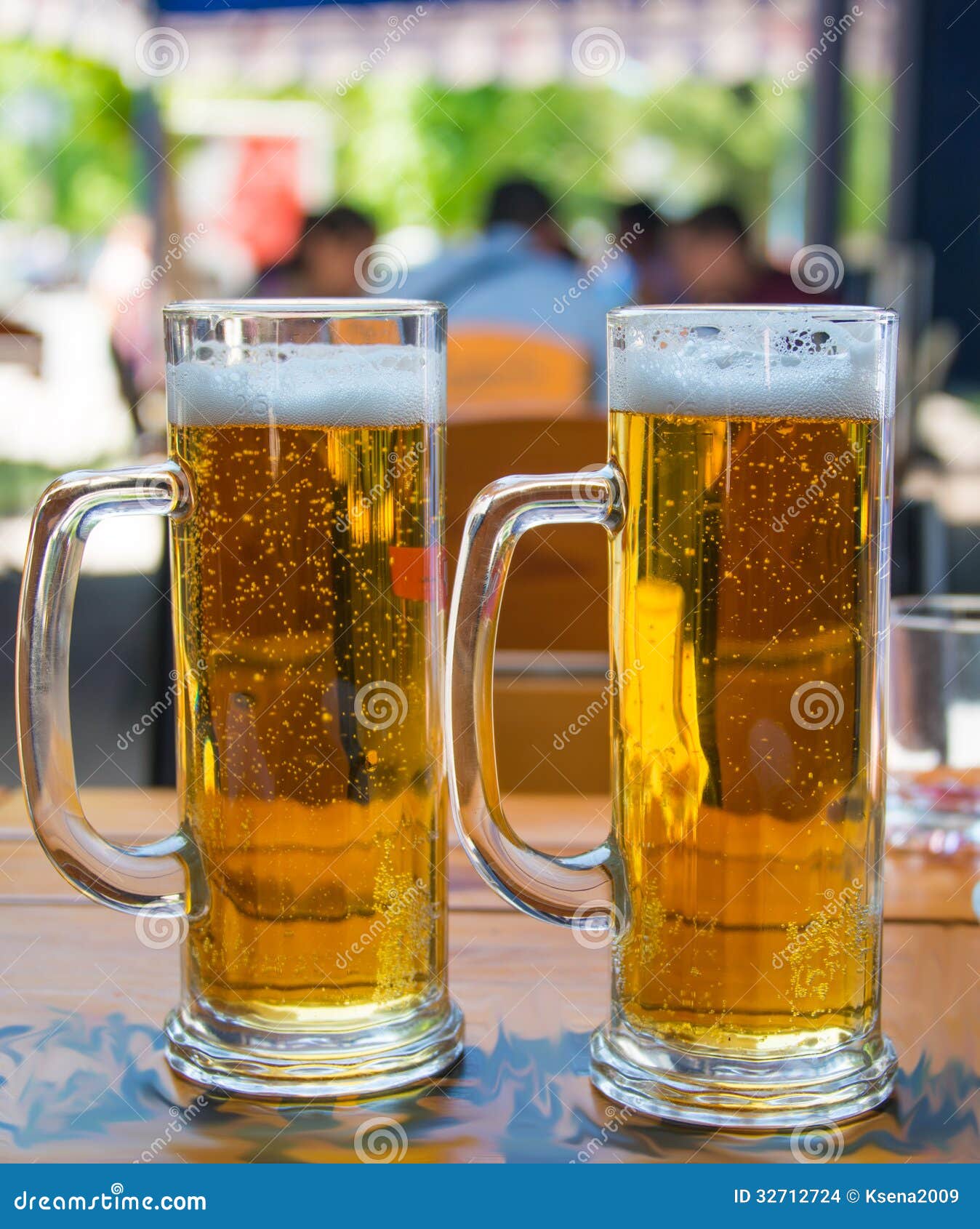 Two beer mugs closeup stock photo. Image of amber, background 32712724