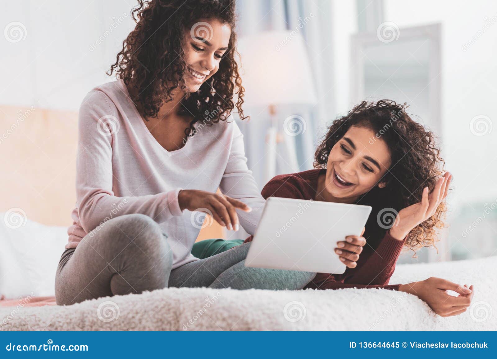Two Best Friends Laughing Reading Funny Stories in the Internet Stock Image  - Image of leisure, domestic: 136644645