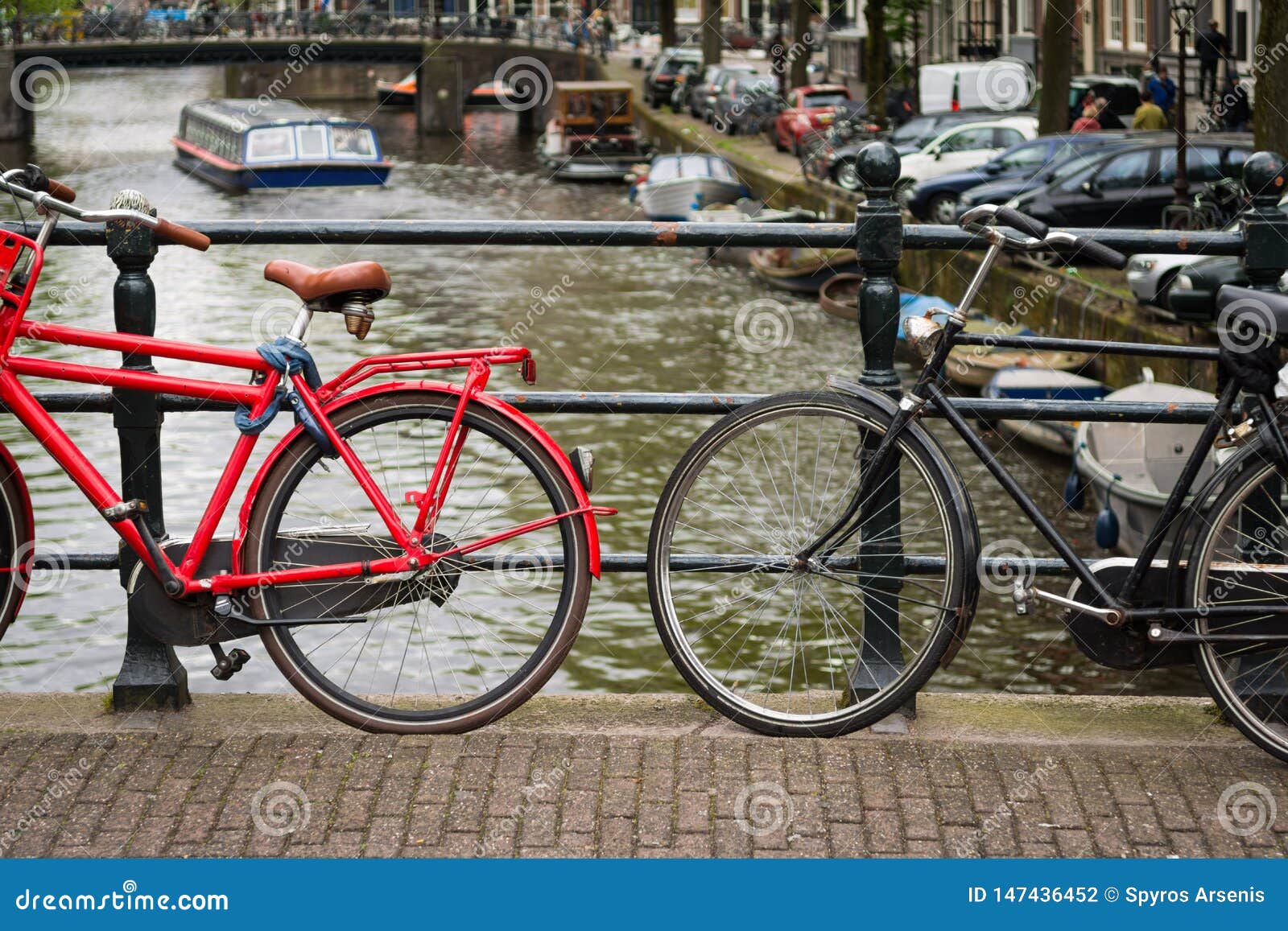 Two Bicycles on a Bridge Over a Canal in Amsterdam, Netherlands Stock ...