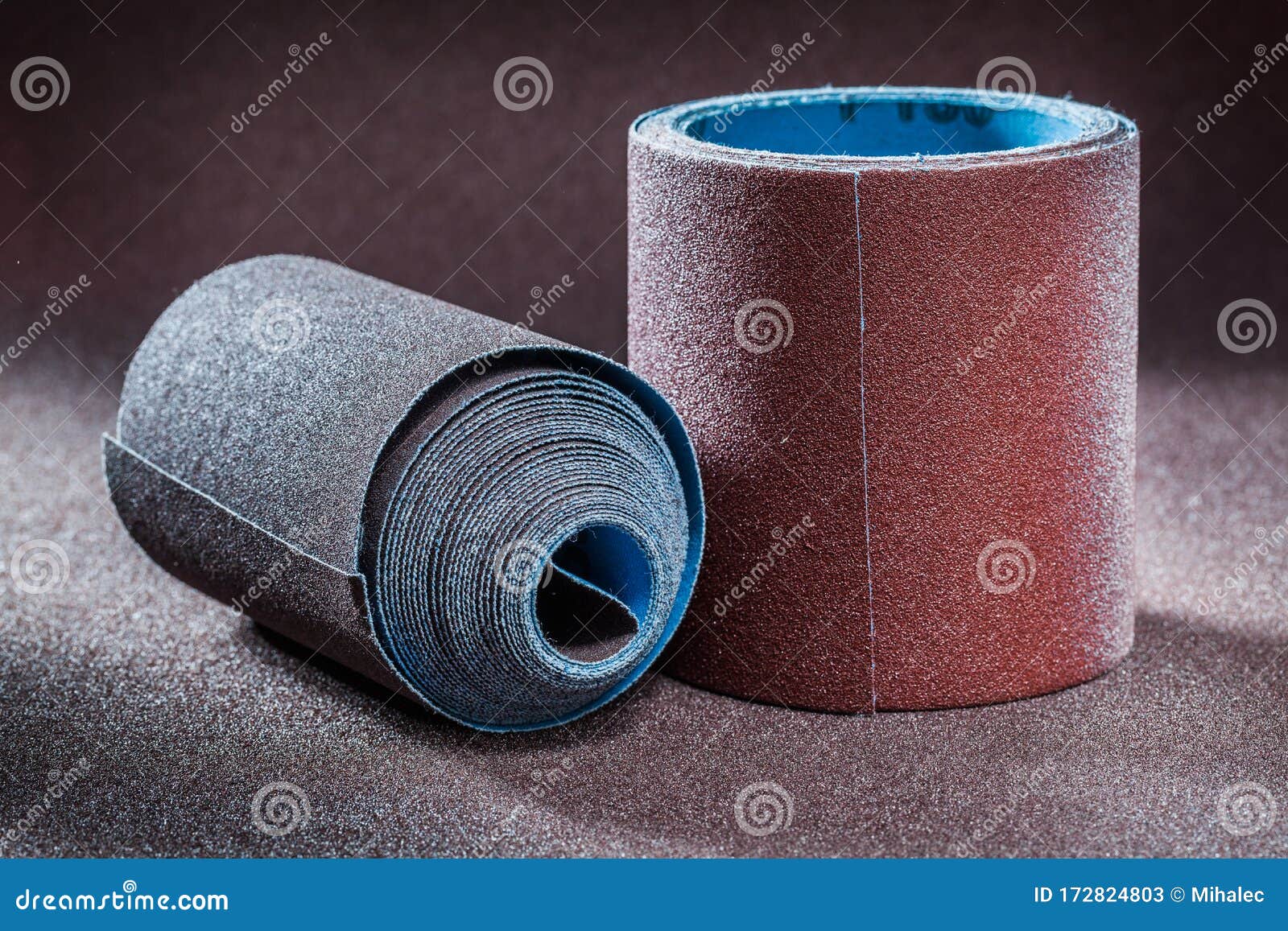 Two Big Rolls of Sand Paper on Abrasive Background Stock Image Image