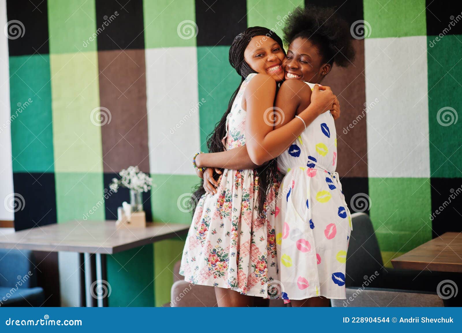 Two Black African Girlfriends at Summer Dresses Posed at Caf picture