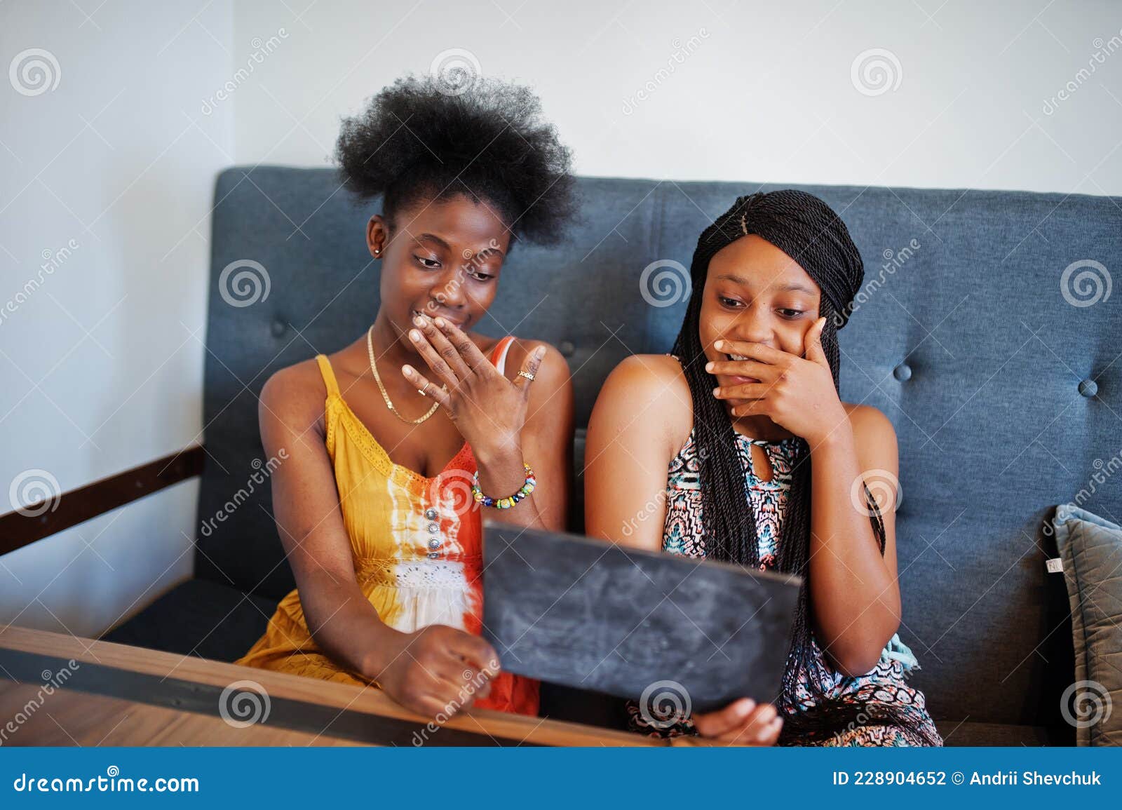 Two Black African Girlfriends at Summer Dresses Posed at Caf