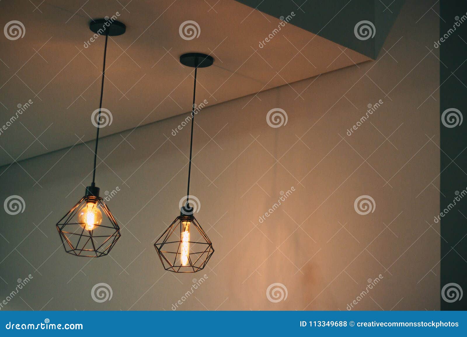 Two Black Pendant Lamp On White Concrete Ceiling Picture Image
