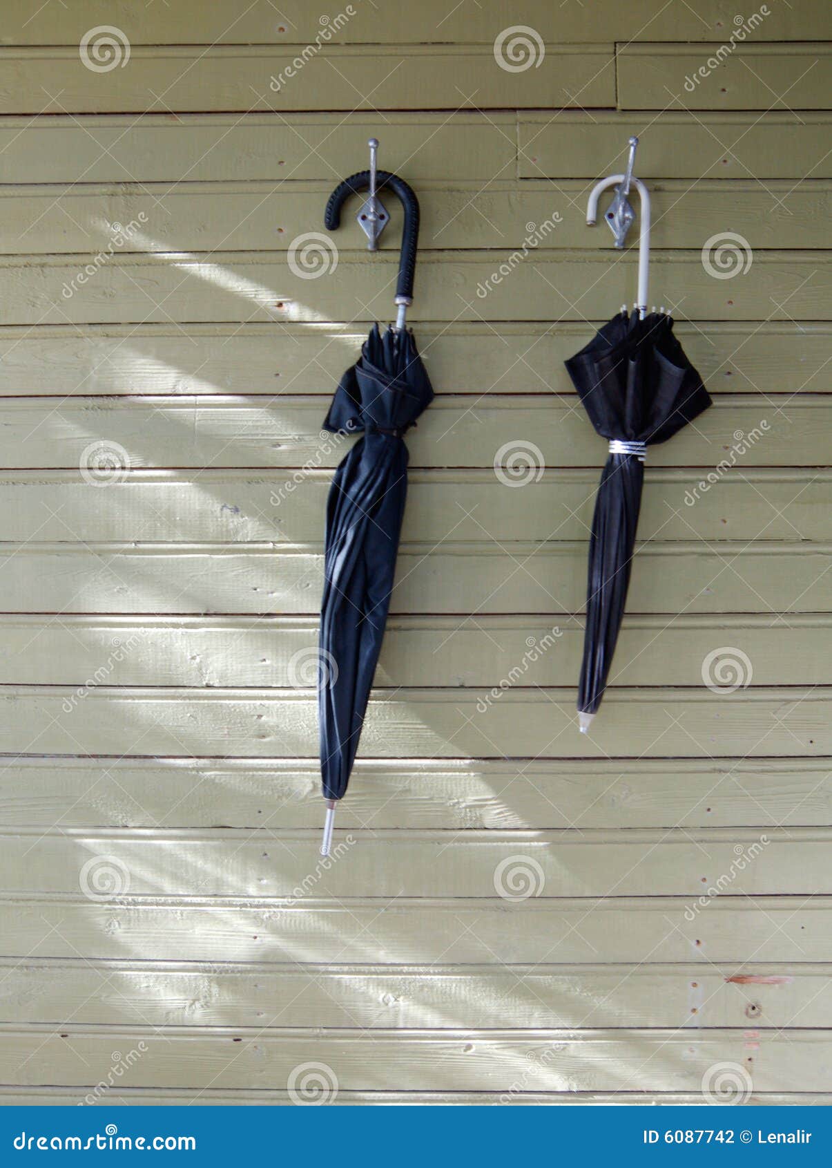 Two black umbrellas stock photo. Image of board, wall 6087742